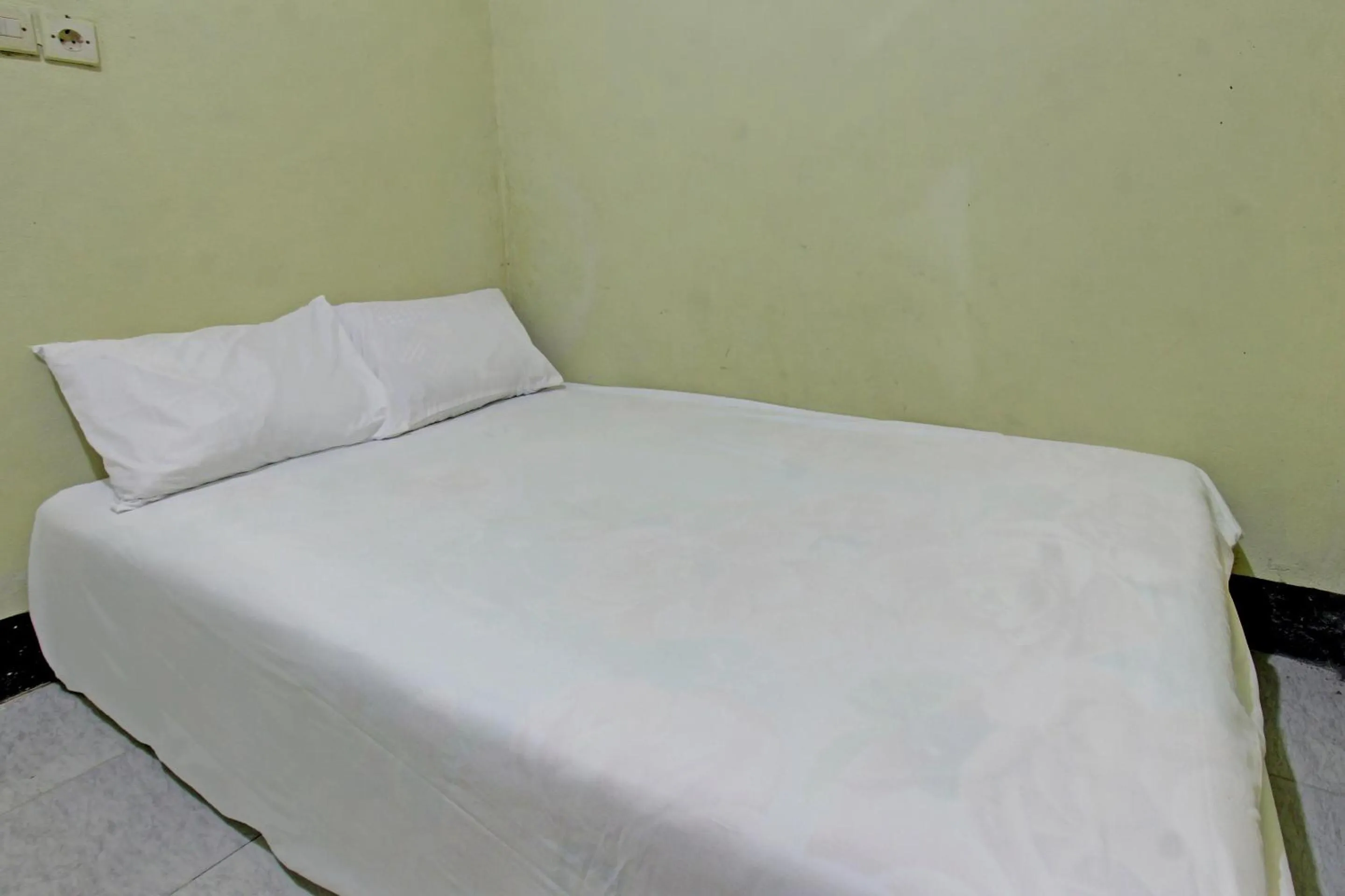 Bedroom, Bed in Hotel O Penginapan 3 Bersaudara Near Pasar Sengkol