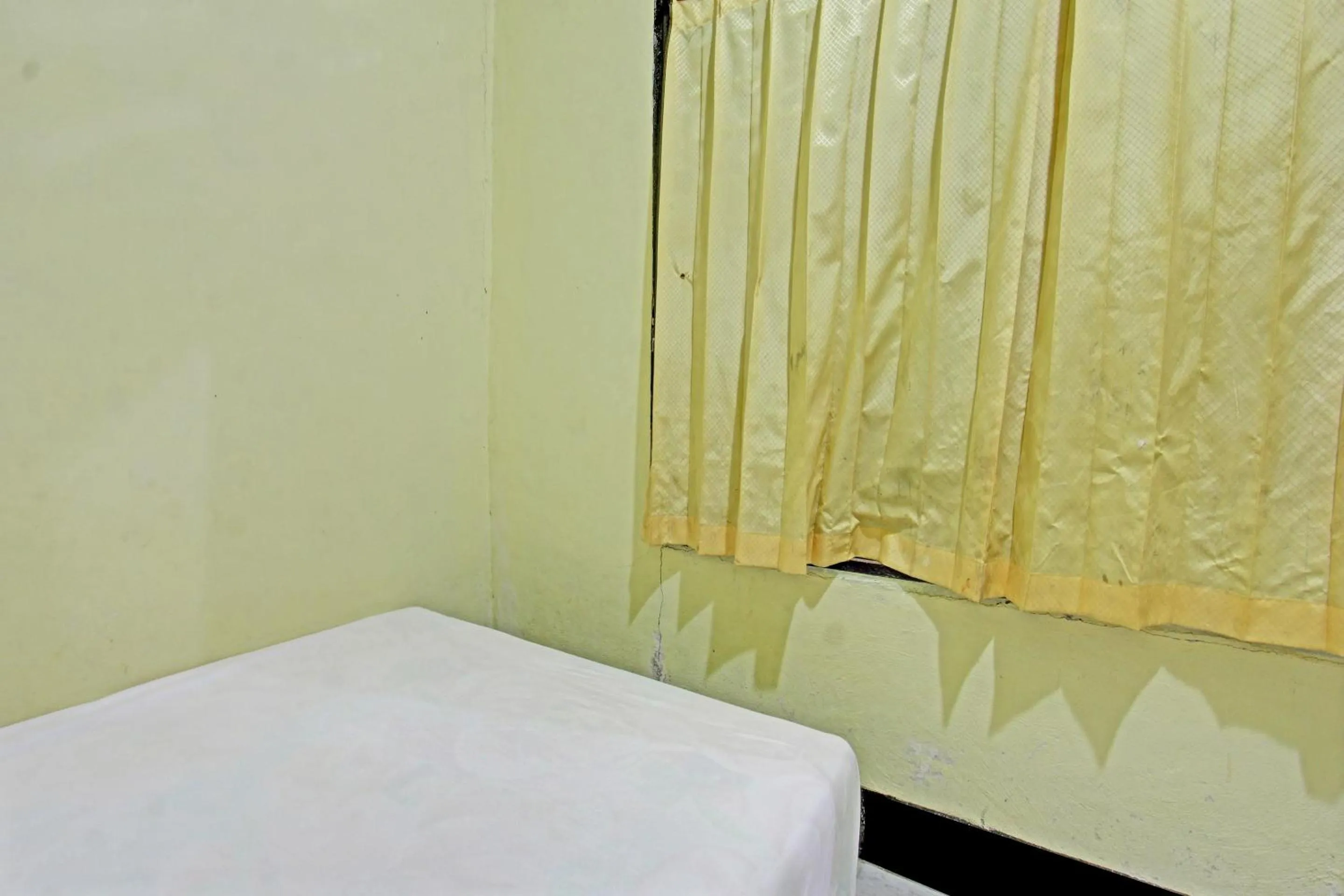 Bedroom, Bed in Hotel O Penginapan 3 Bersaudara Near Pasar Sengkol