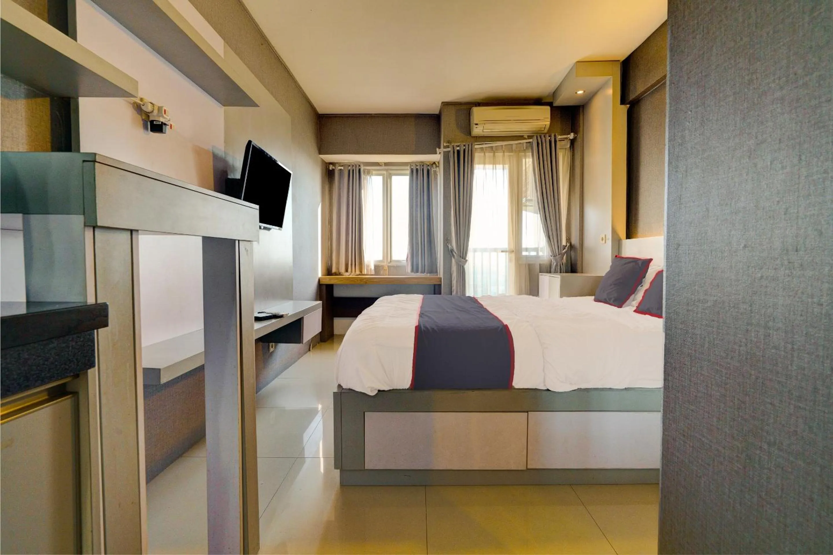 Bedroom in Collection O 92870 Apartement Grand Sentraland Karawang By Ipul