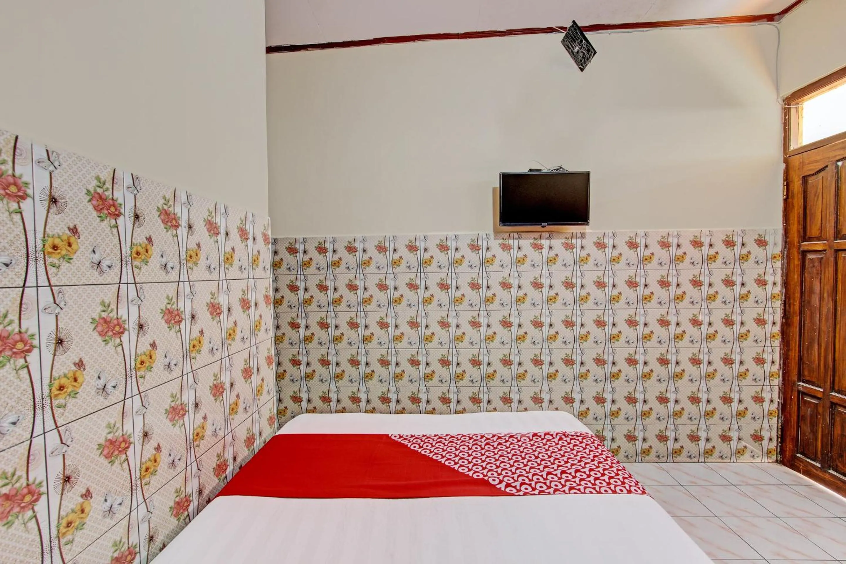 Bedroom in OYO 92884 Agustha Homestay