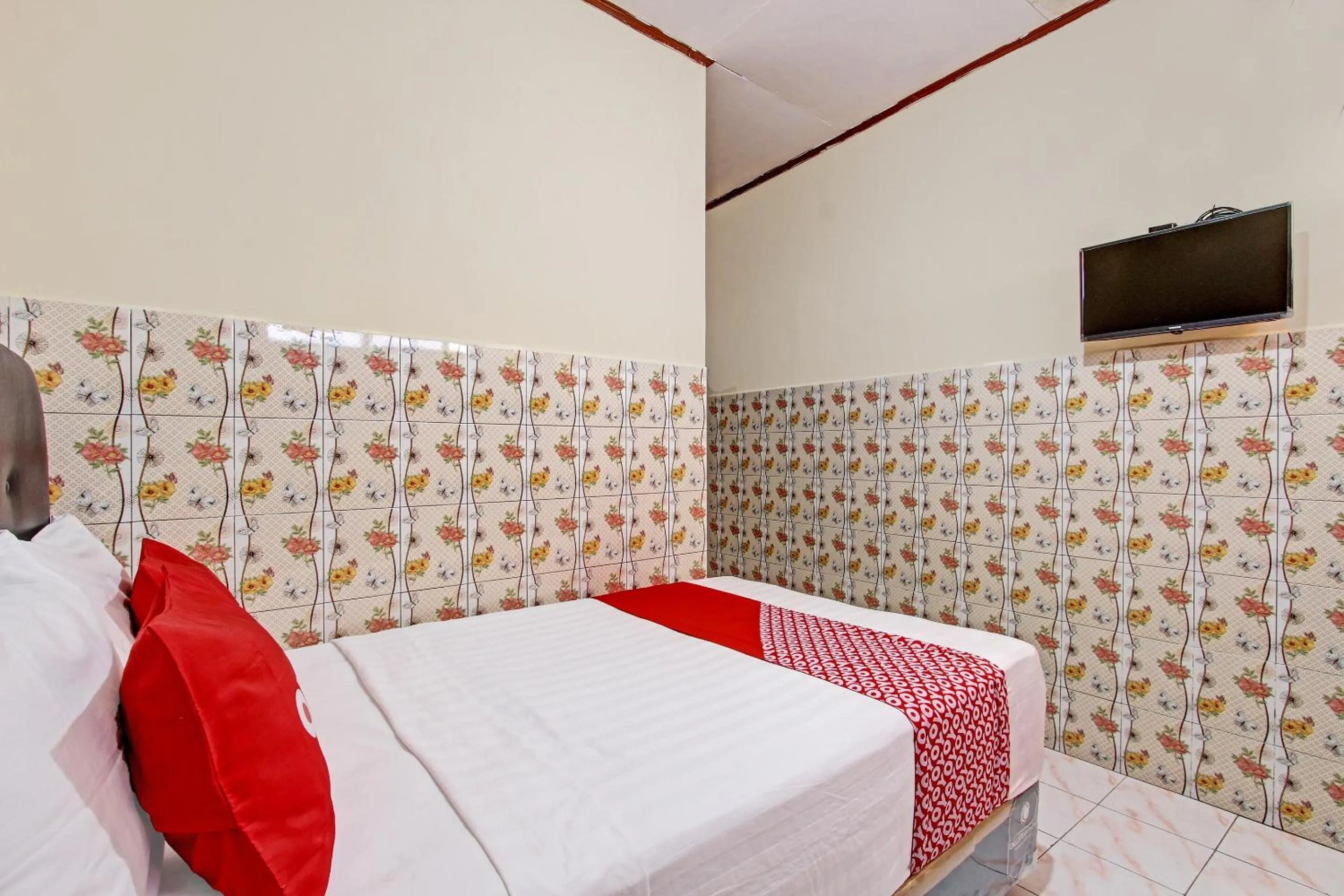 Bedroom in OYO 92884 Agustha Homestay