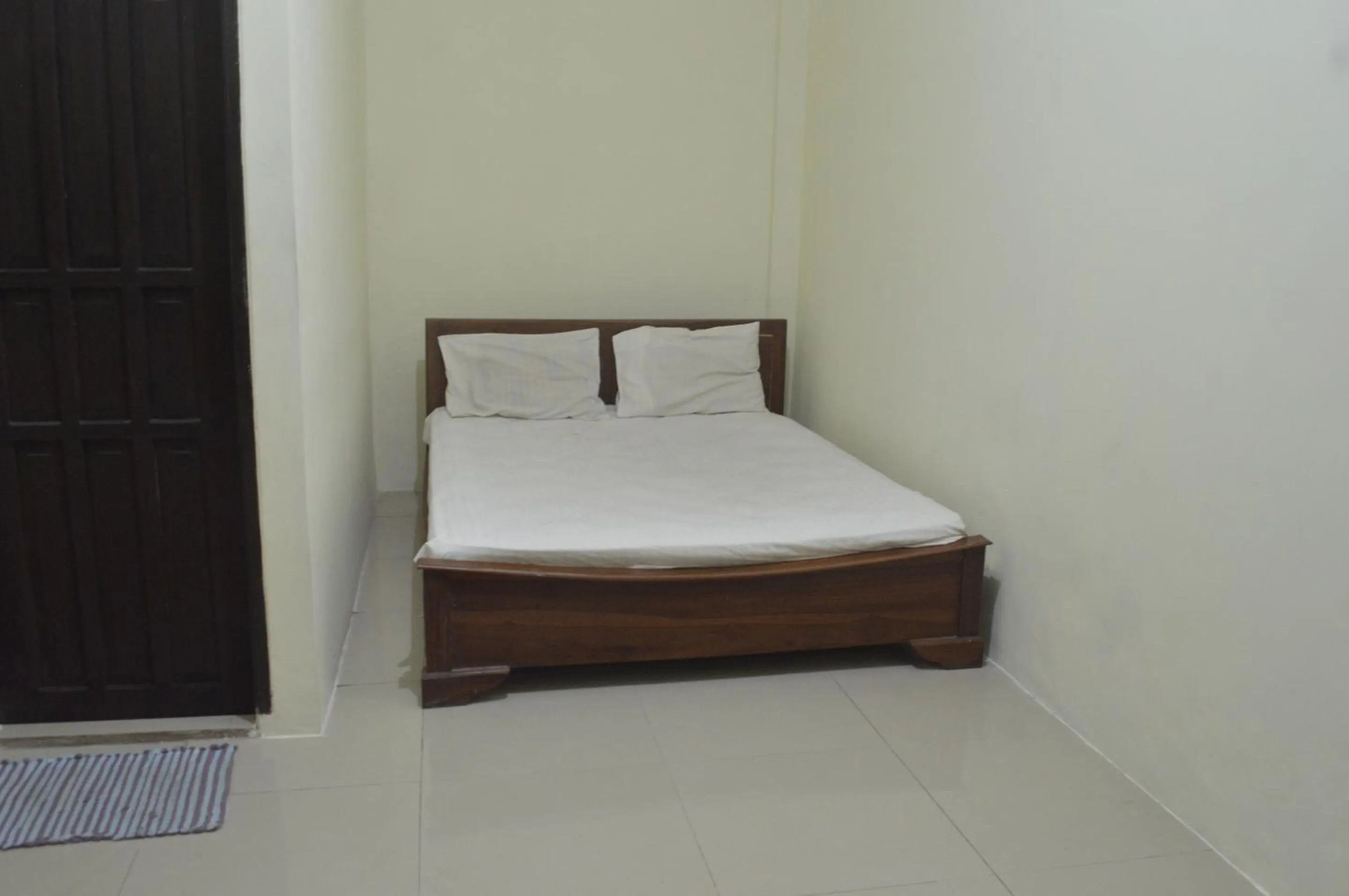 Bedroom, Bed in Hotel O Wisma Nusantara Near SD GMIM Wiau Lapi