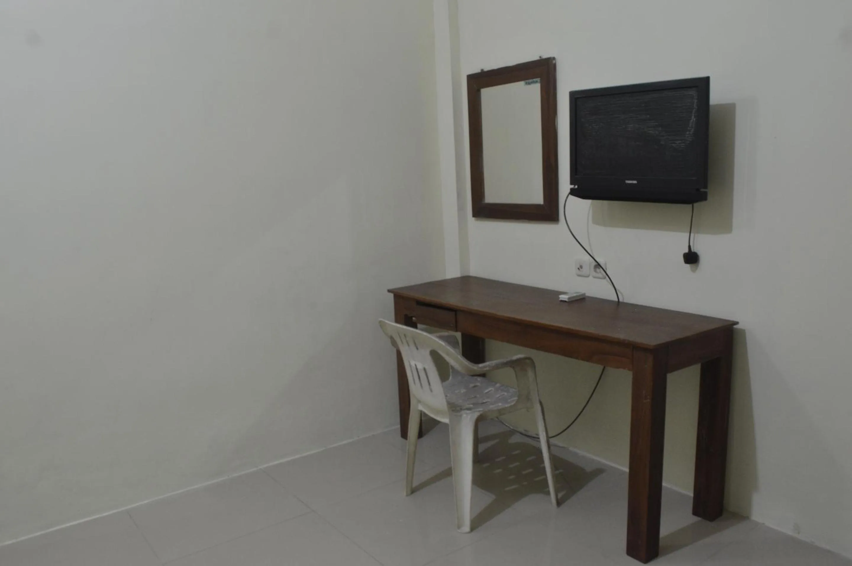 Bedroom in OYO 92880 Wisma Nusantara