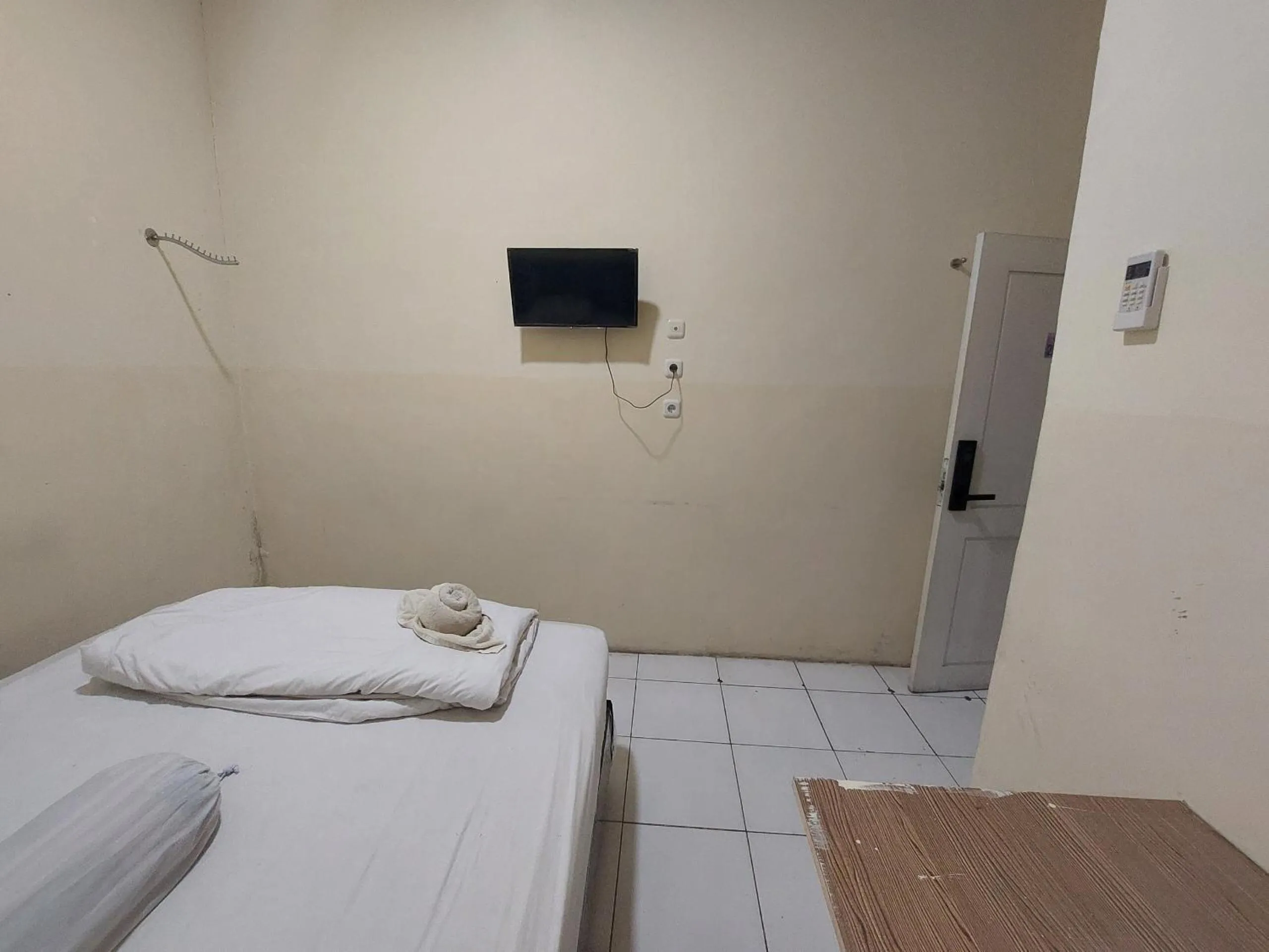 Bedroom, Bed in Hotel O Mahendra HomestayNearTaman Wisata Bukit Rurukan