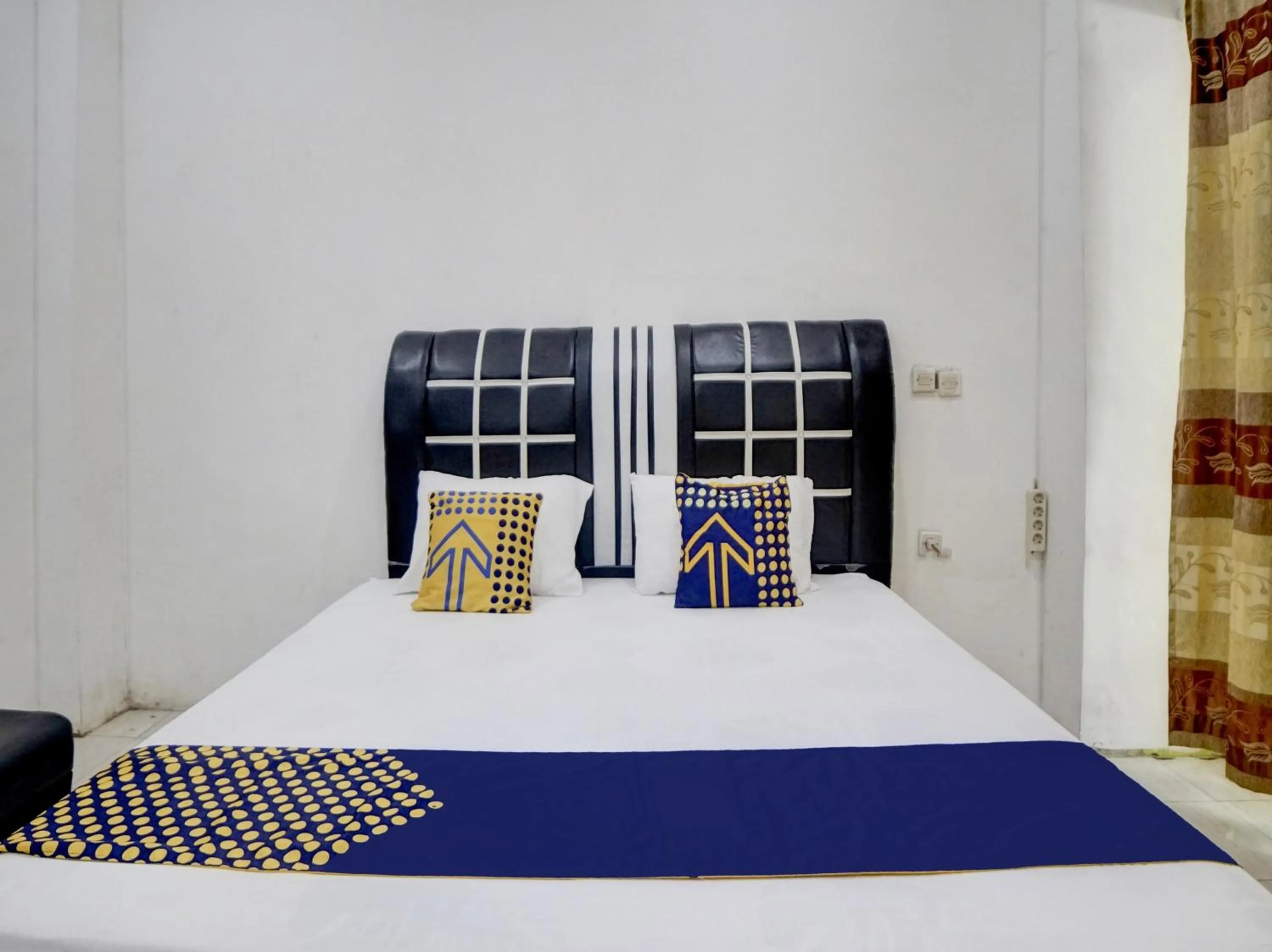 Bedroom, Bed in Hotel O Penginapan Pakam