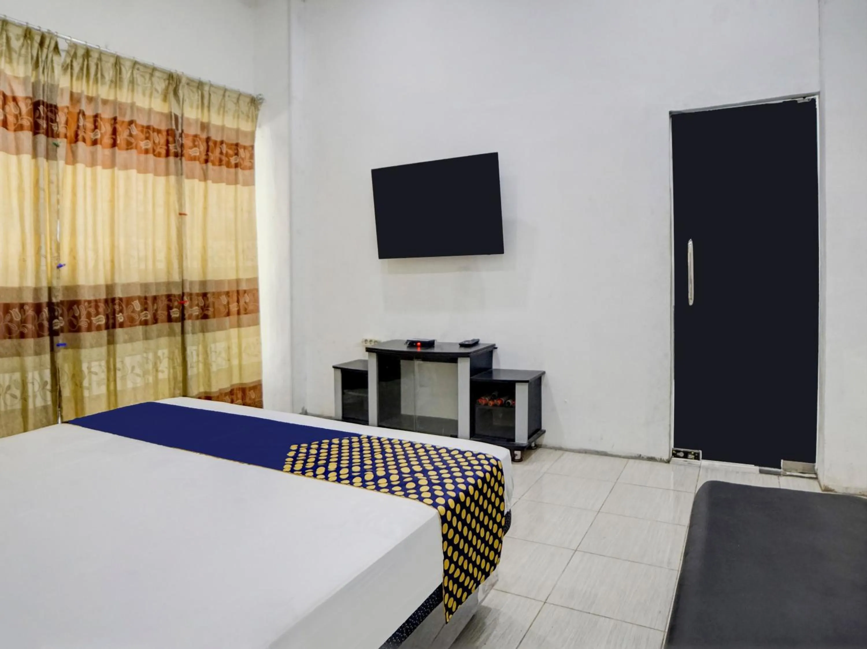 Bedroom, Bed in Hotel O Penginapan Pakam