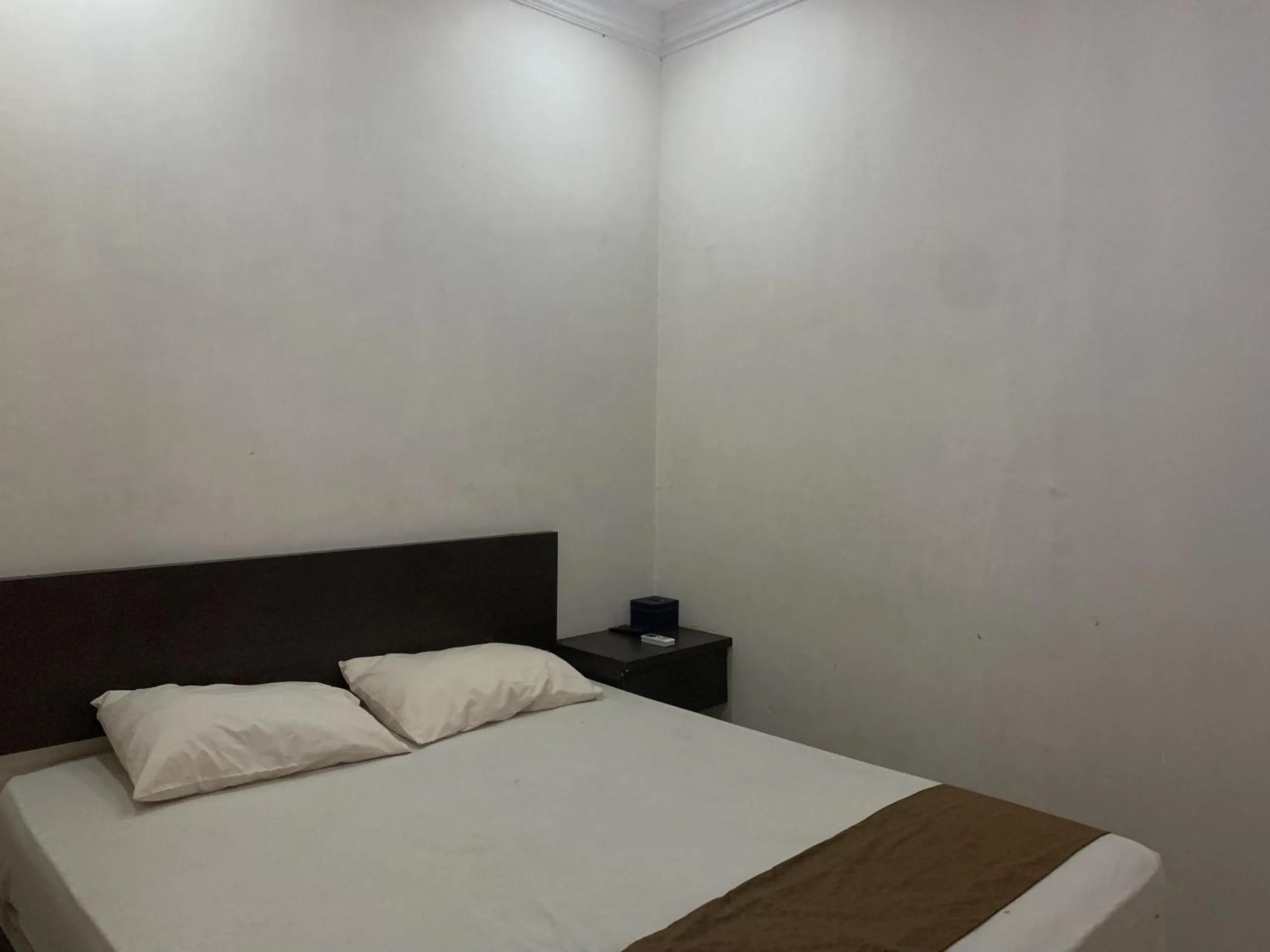 Bedroom, Bed in Hotel O Penginapan Laota Syariah Near Rumah Sakit Islam Faisal Makassar
