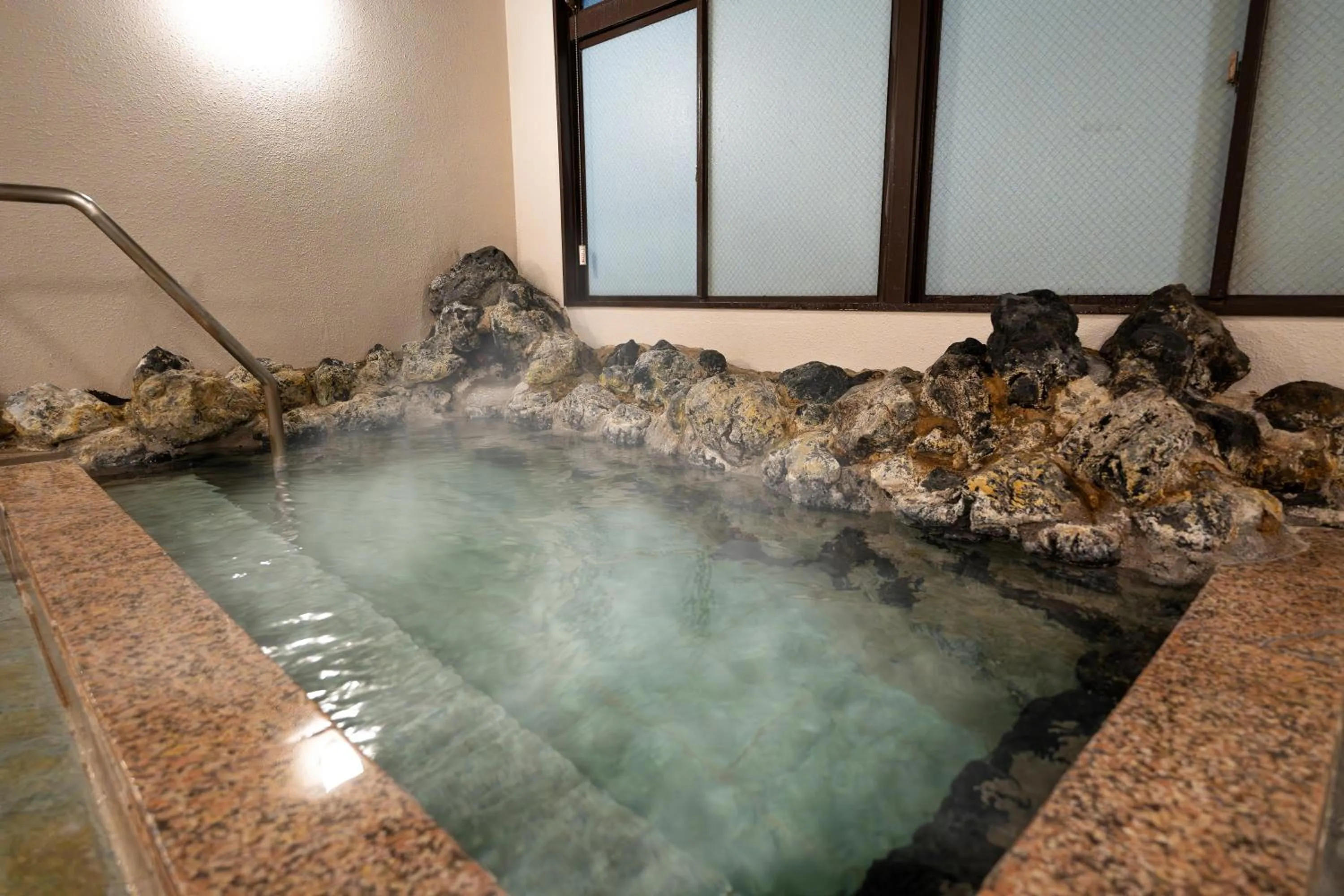 Hot Spring Bath in KAMENOI HOTEL Kusatsu Yubatake