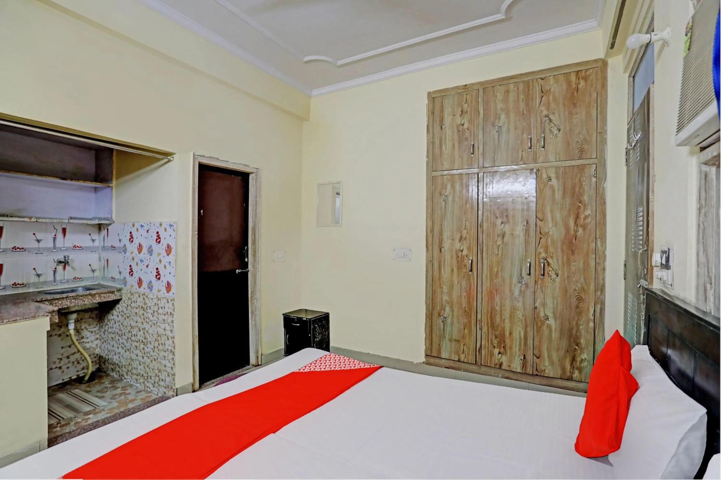 Bedroom, Bed in Hotel O Wamson Alpha Co living Stays