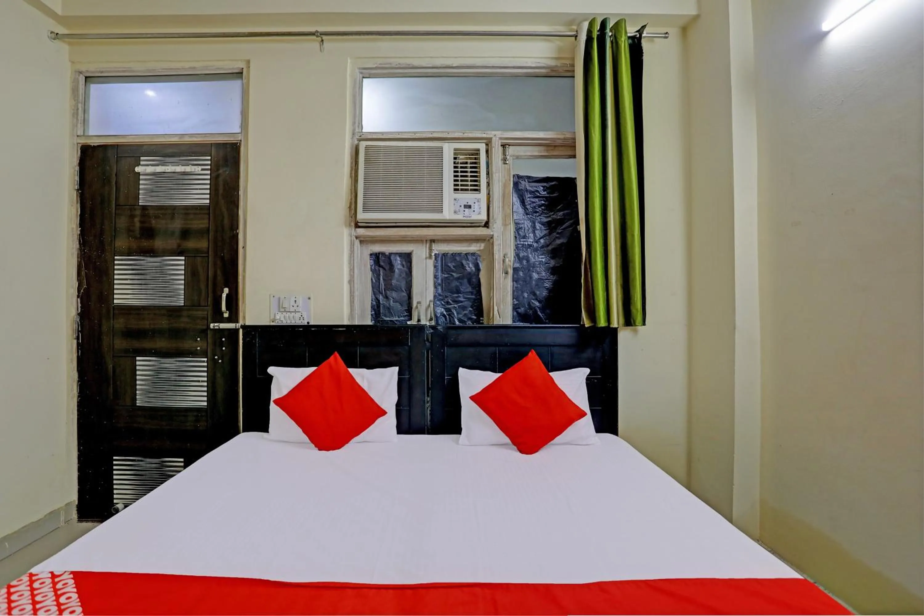 Bedroom, Bed in Hotel O Wamson Alpha Co living Stays