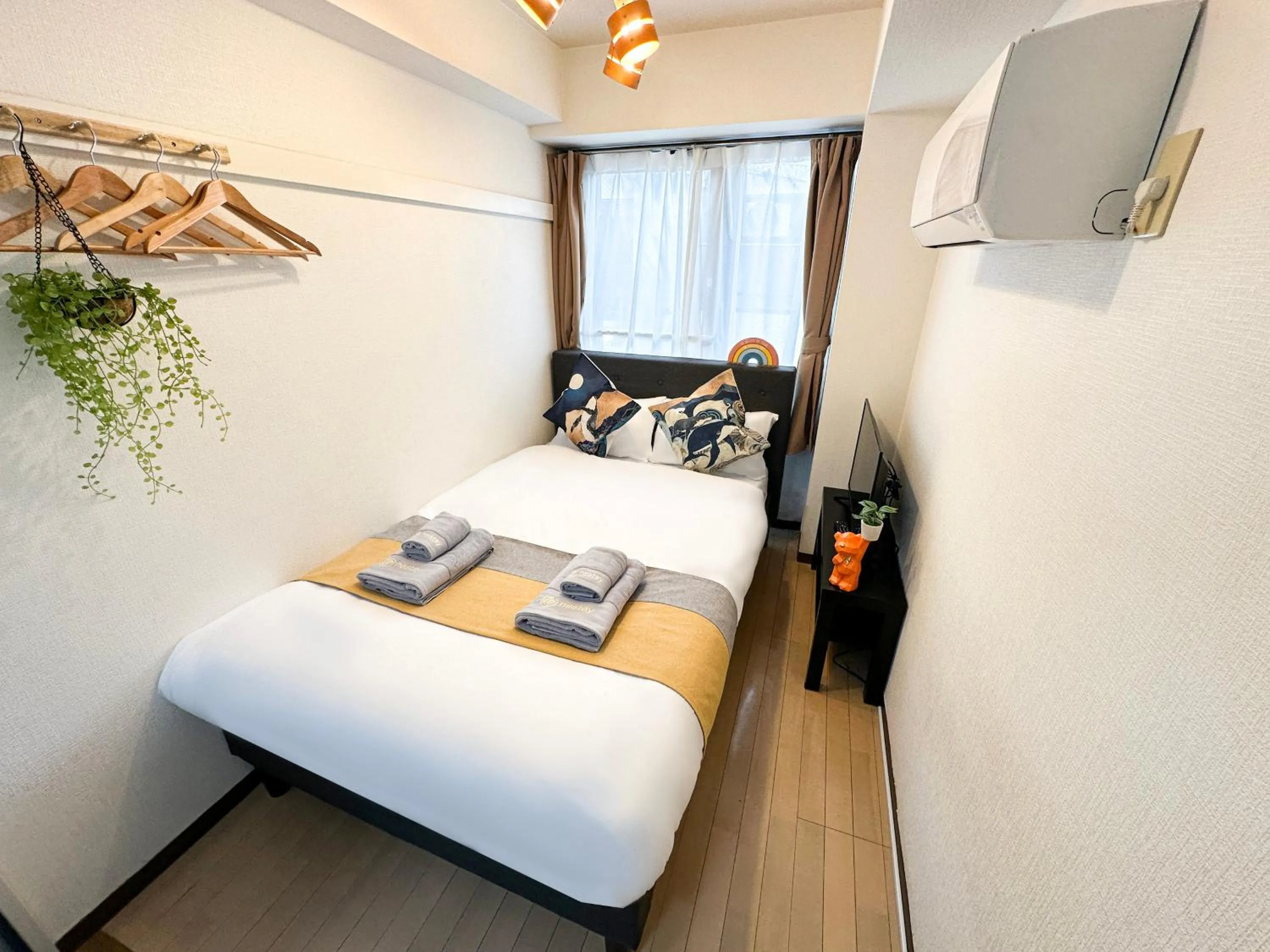 Bed in nestay apartment tokyo itabashi