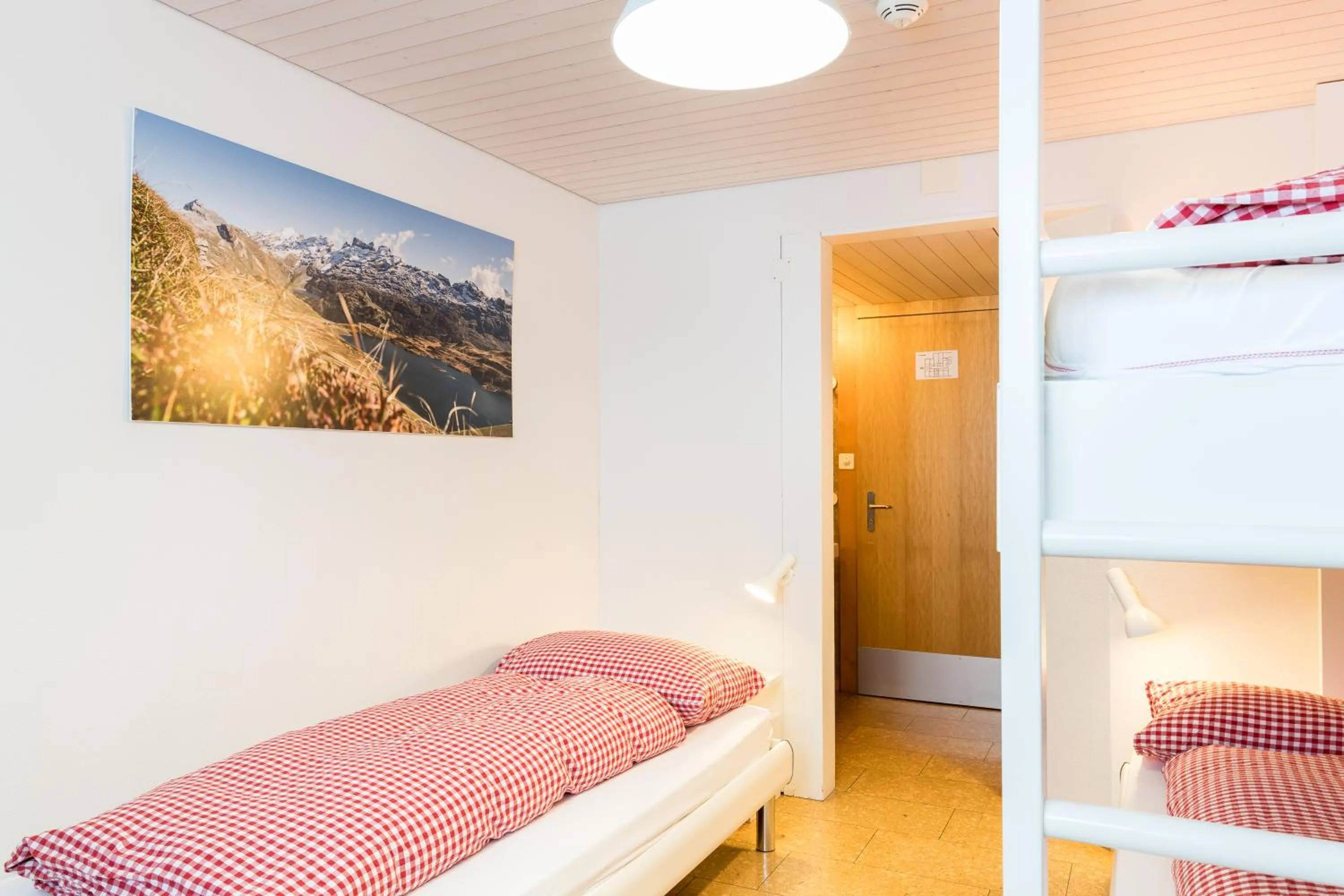 Photo of the whole room, Bed in Berghotel Distelboden