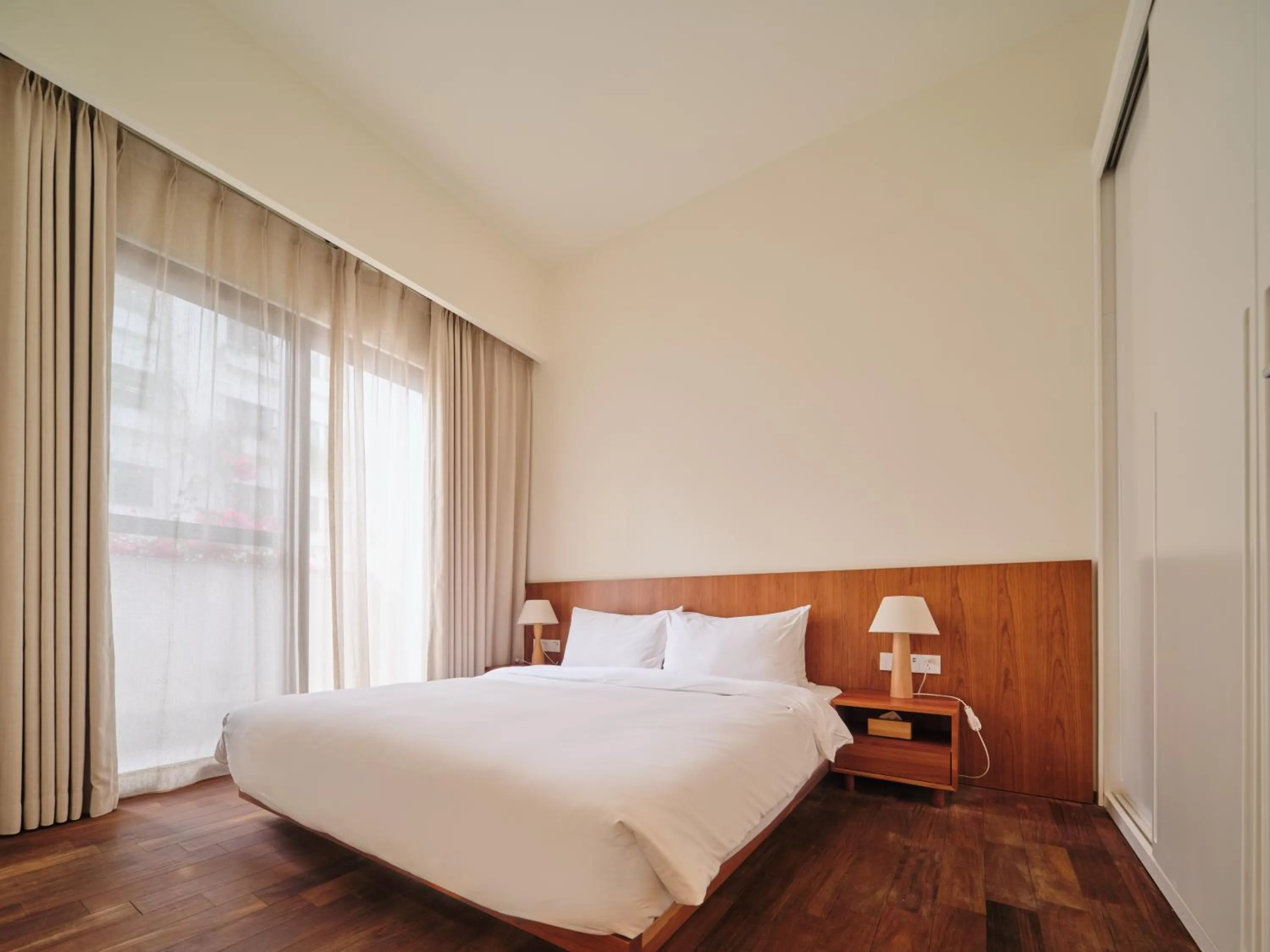 Bedroom, Bed in Wutong Hotel Apartment Bao'an Center