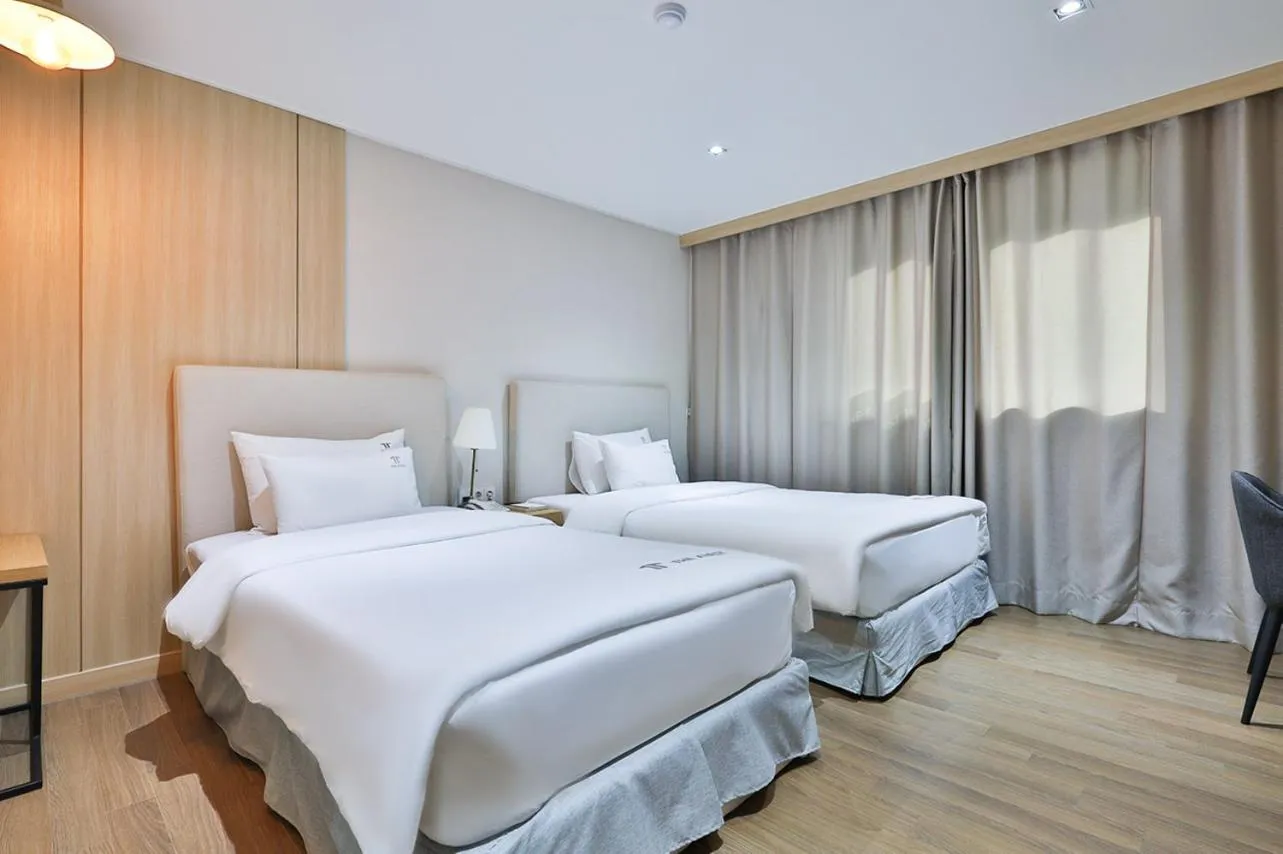 Bed in The First Hotel