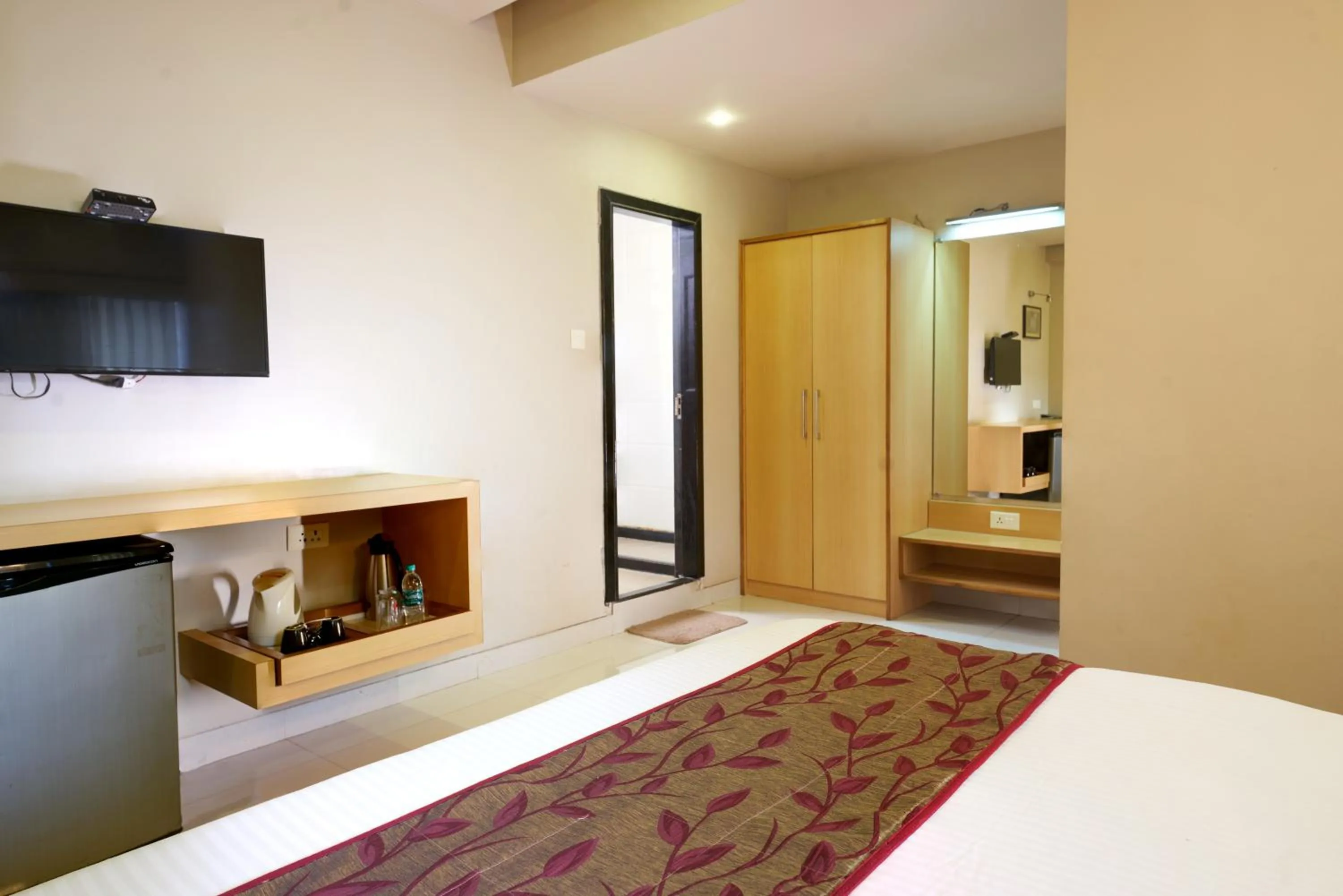 TV and multimedia, Bed in Hotel Prestige, Mangalore