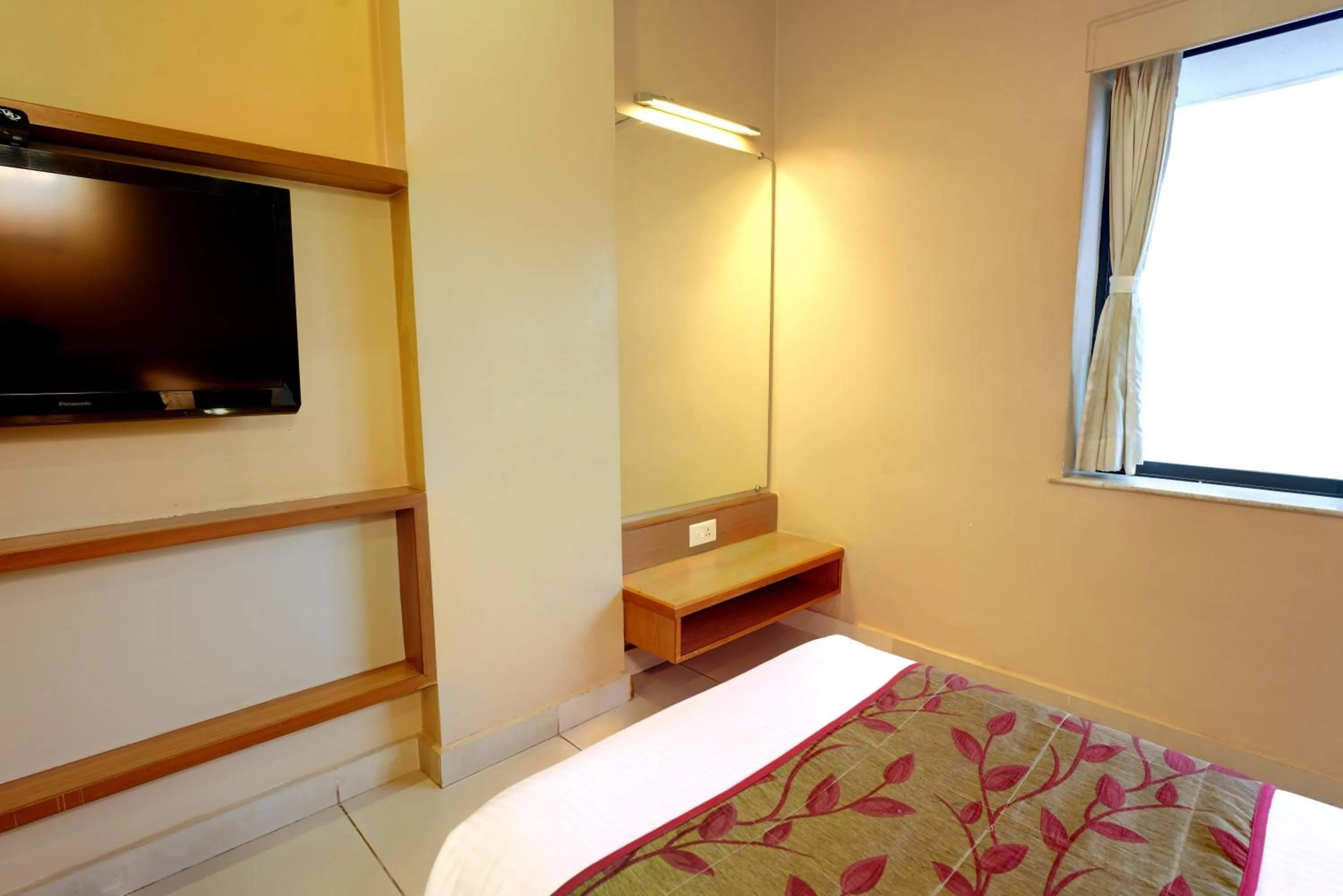 TV and multimedia, Bed in Hotel Prestige, Mangalore
