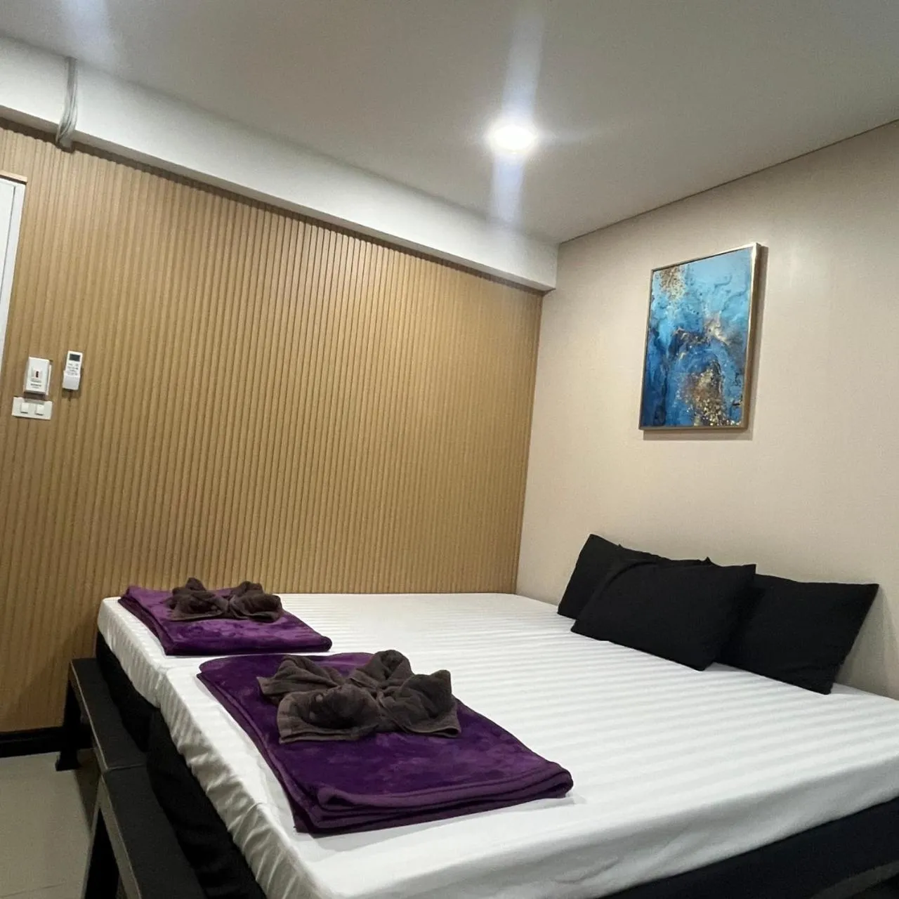 Bed in DonMueang station hotel