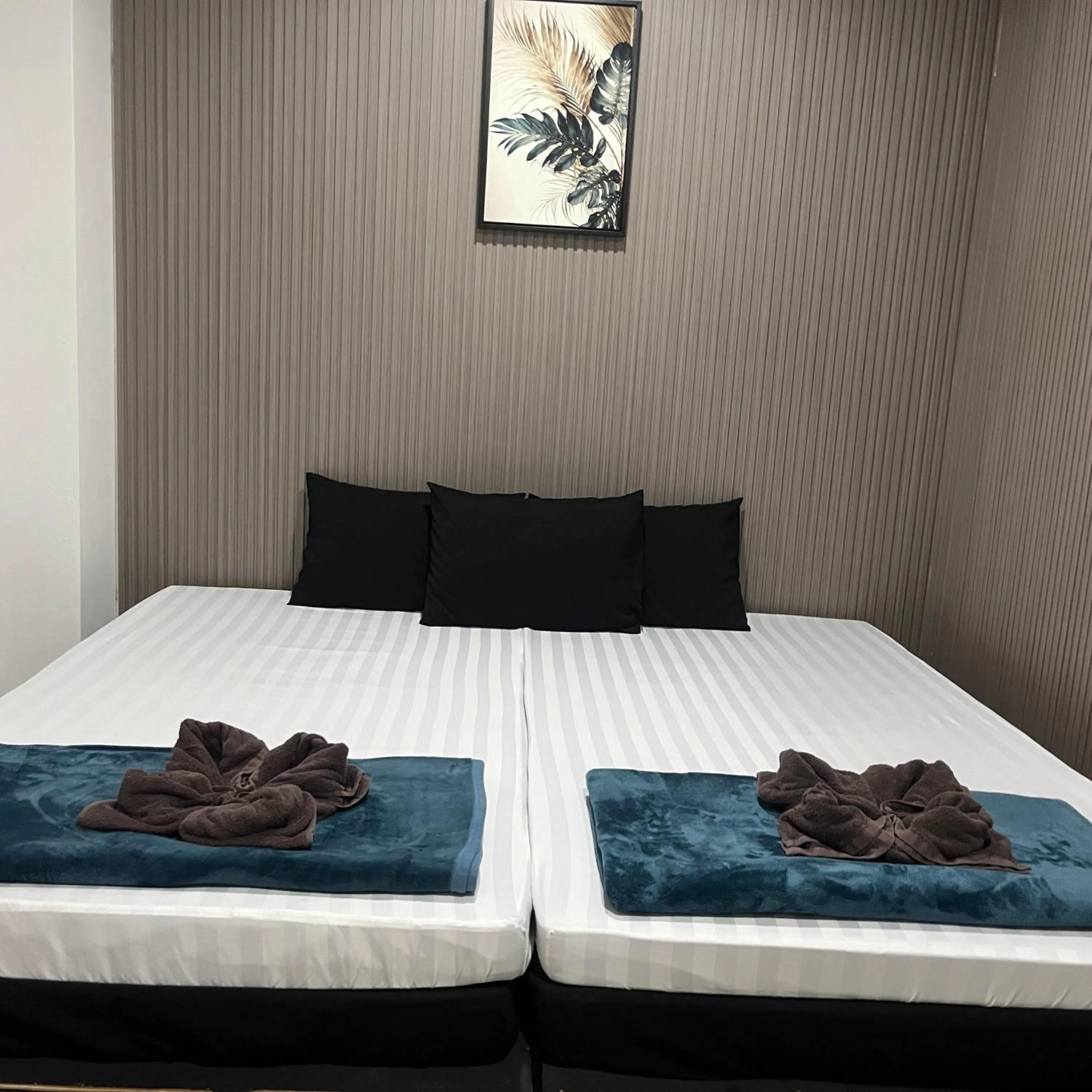 Bed in DonMueang station hotel