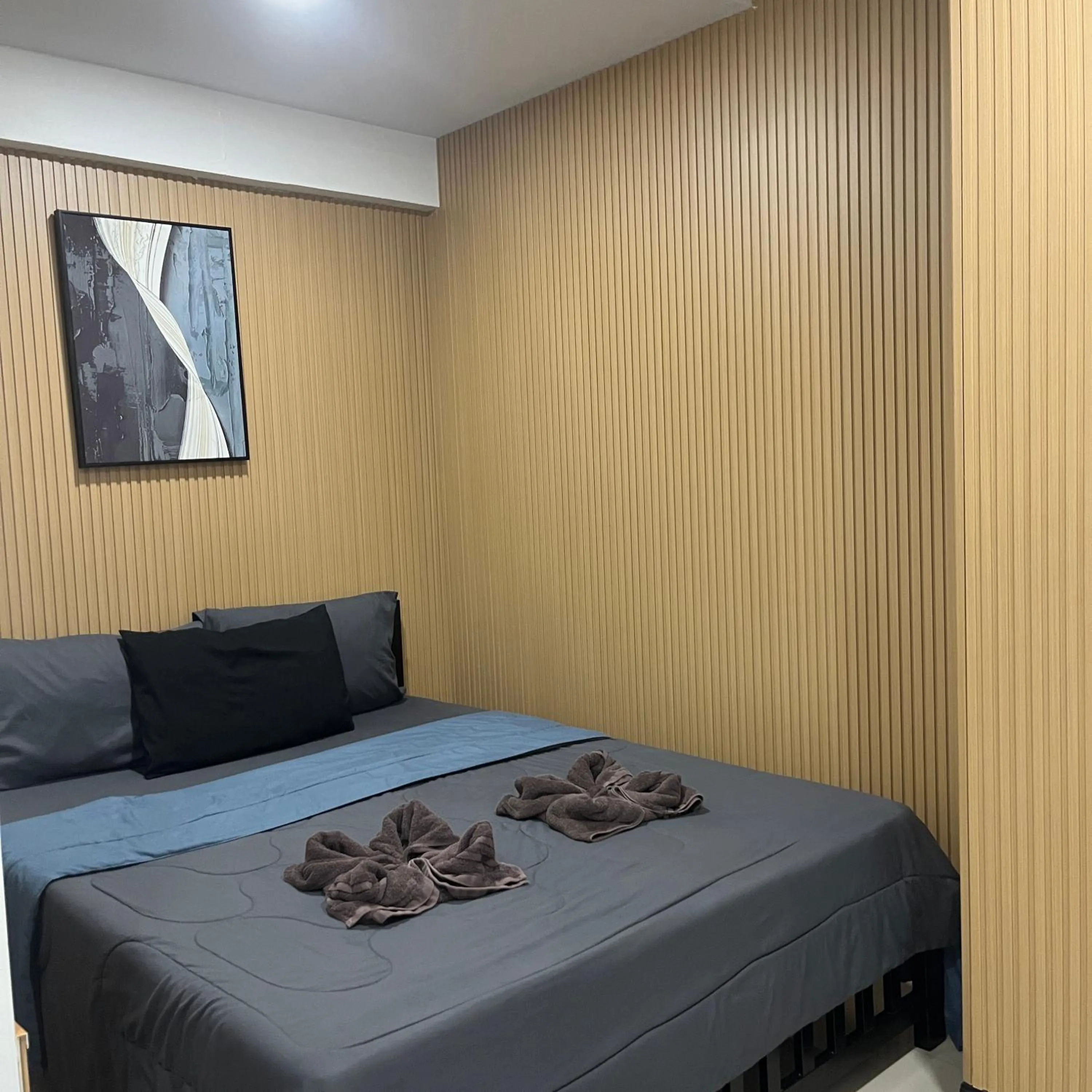 Bed in DonMueang station hotel