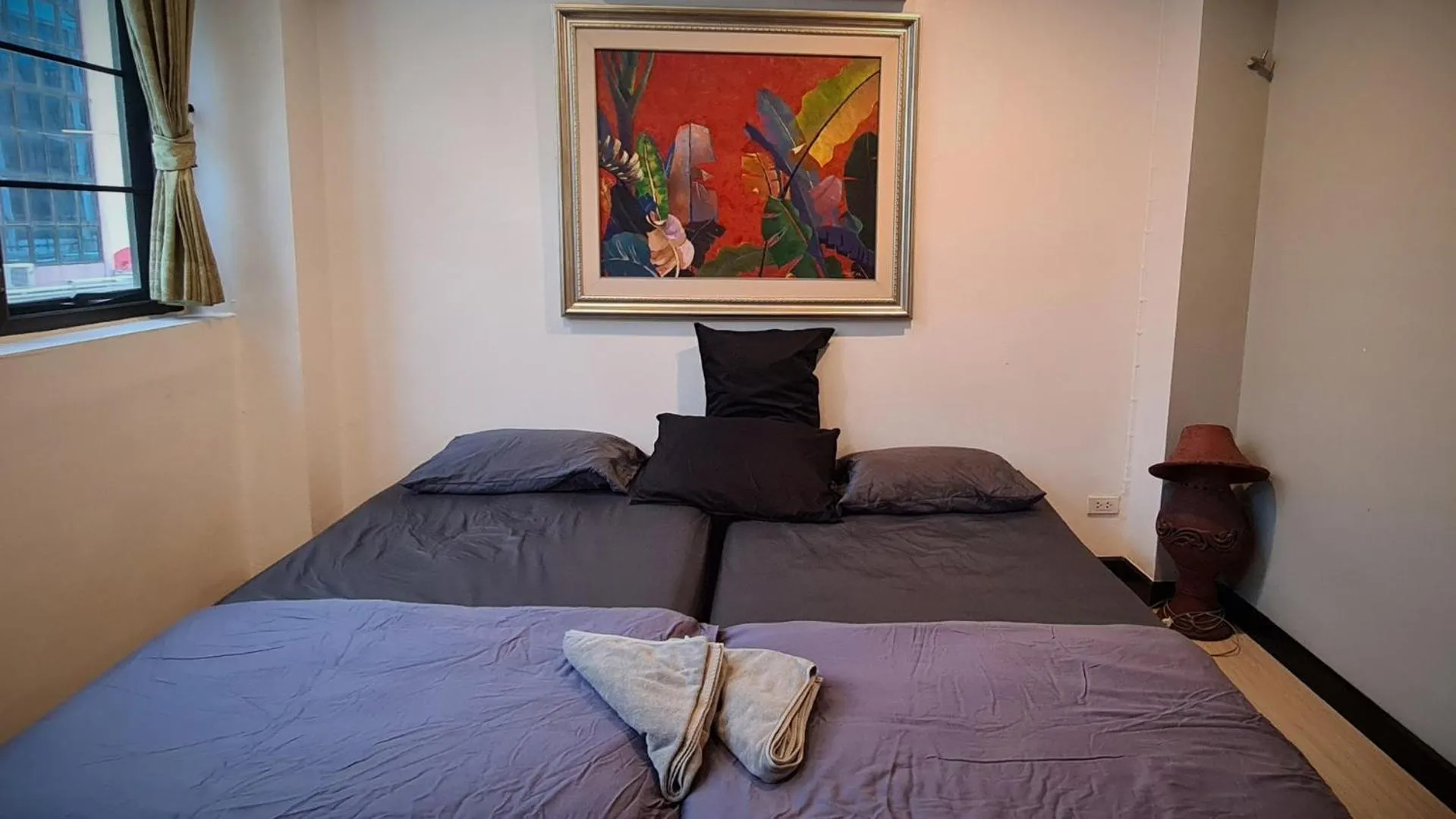 Bed in DonMueang station hotel