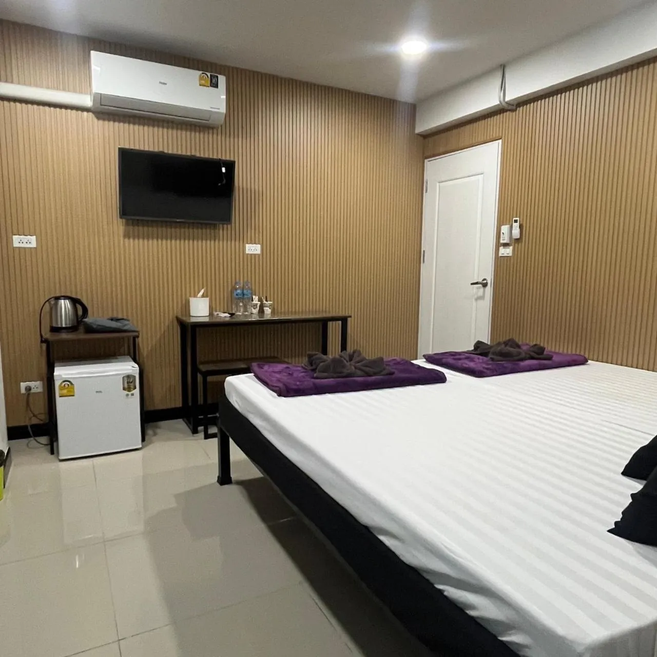 Bed in DonMueang station hotel