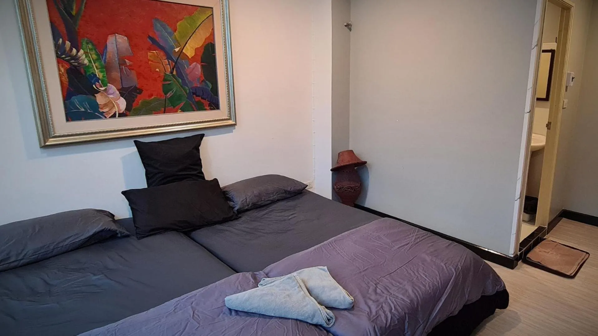 Bed in DonMueang station hotel