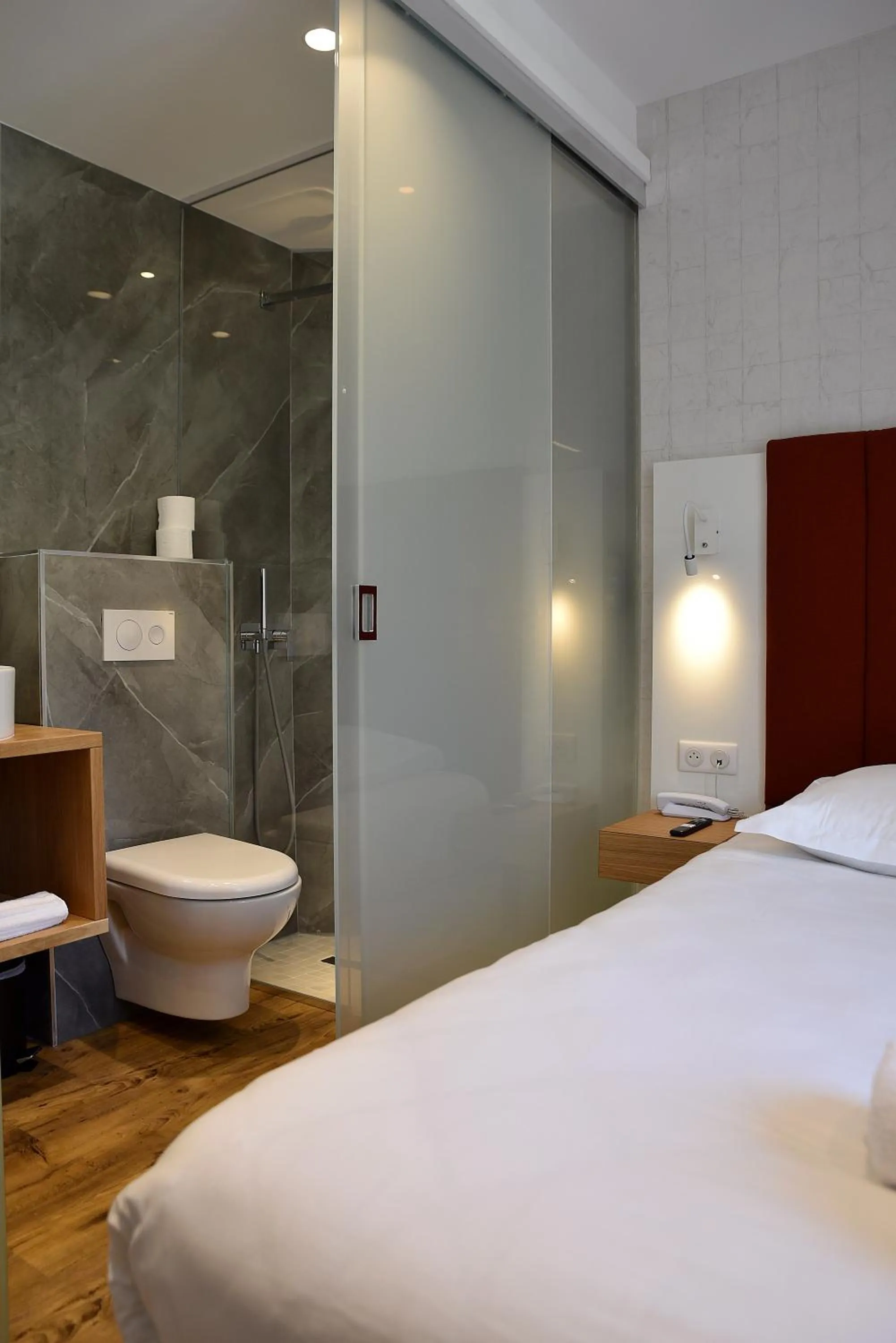 Bed in HOTEL SAINT ROCH