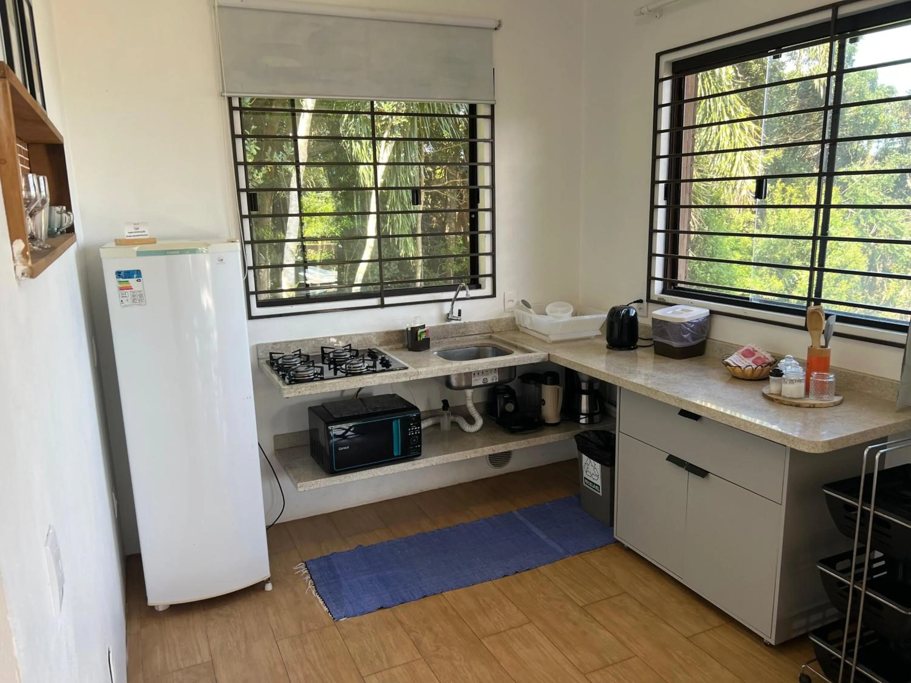 Kitchen or kitchenette in Chalés e Bangalôs Ibiraquera