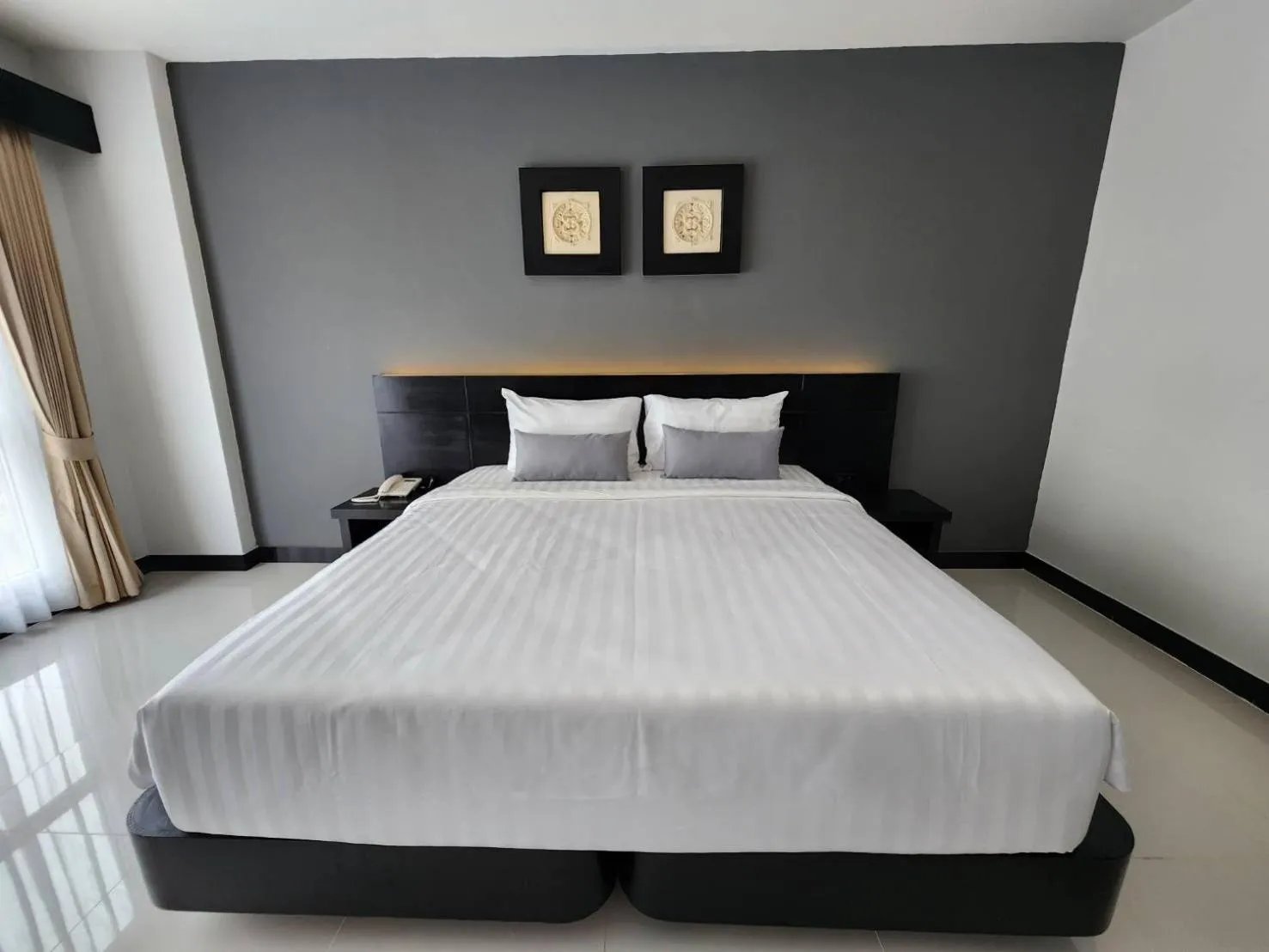 Bed in LHC HOTEL AND RESORT