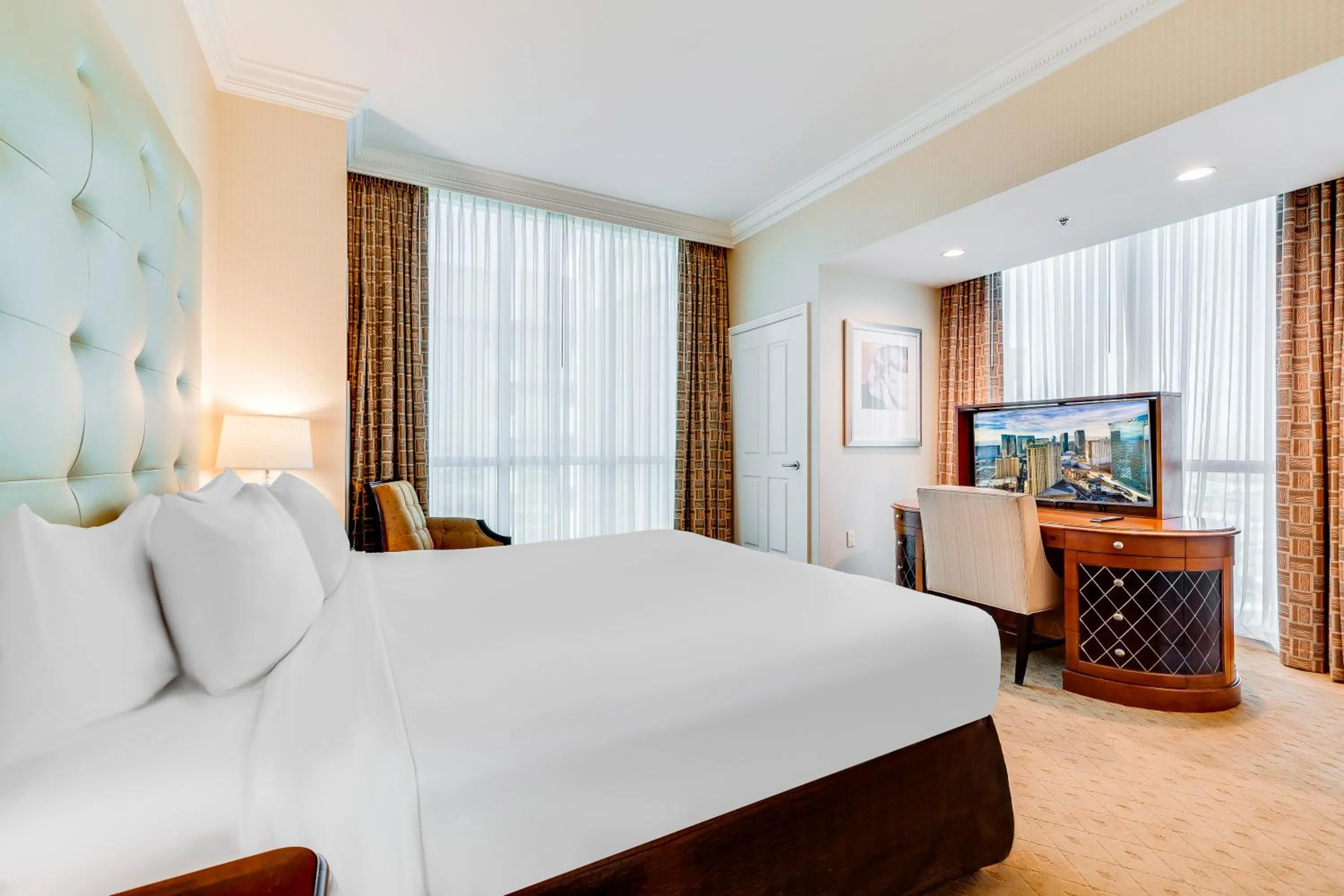 Bed in Jet Luxury at The Signature Condo Hotel