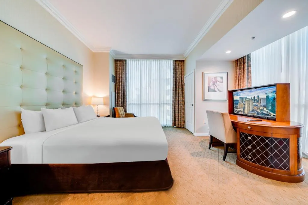 Bed in Jet Luxury at The Signature Condo Hotel