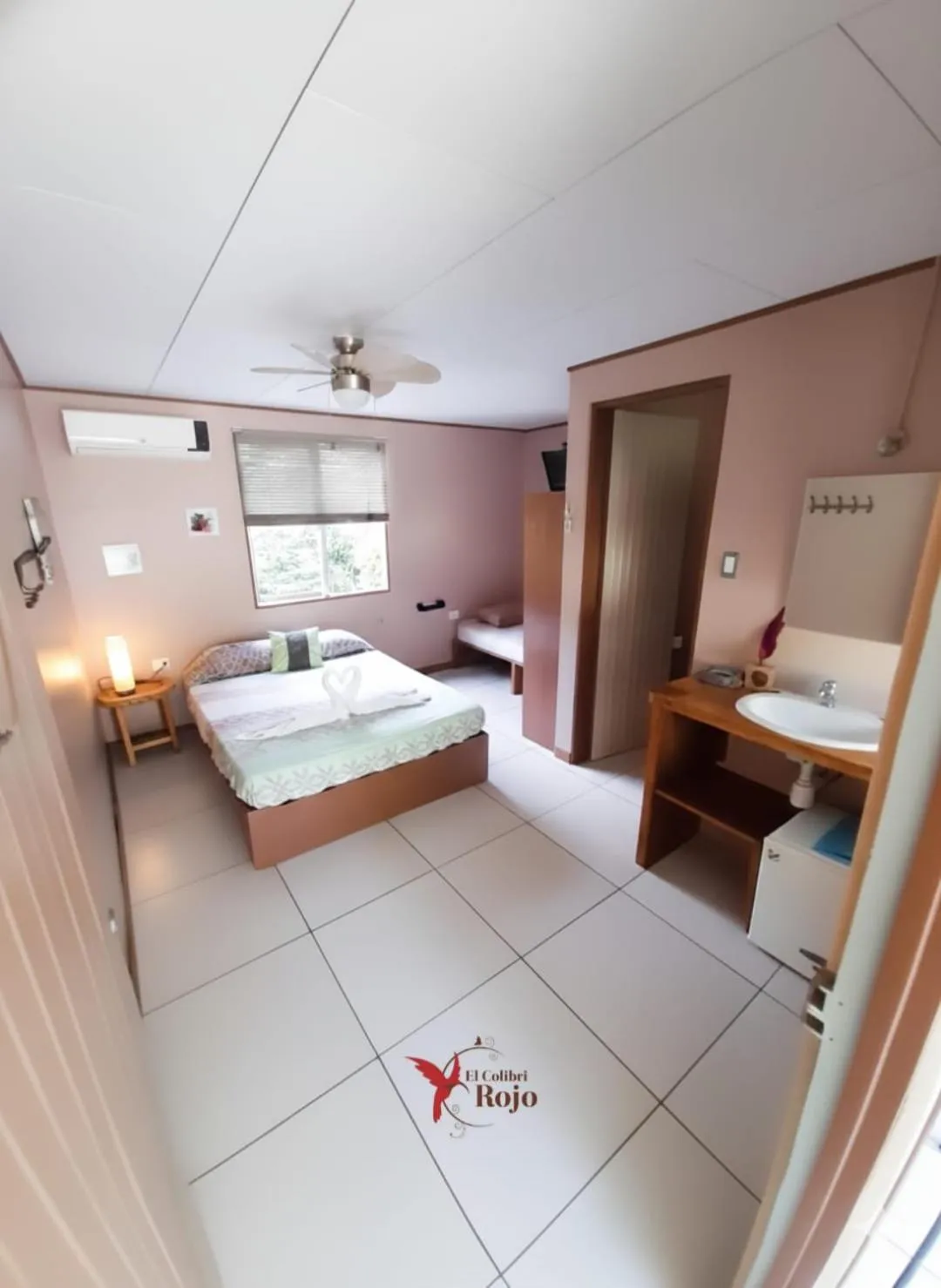 Bed in Hotel El Colibri Rojo