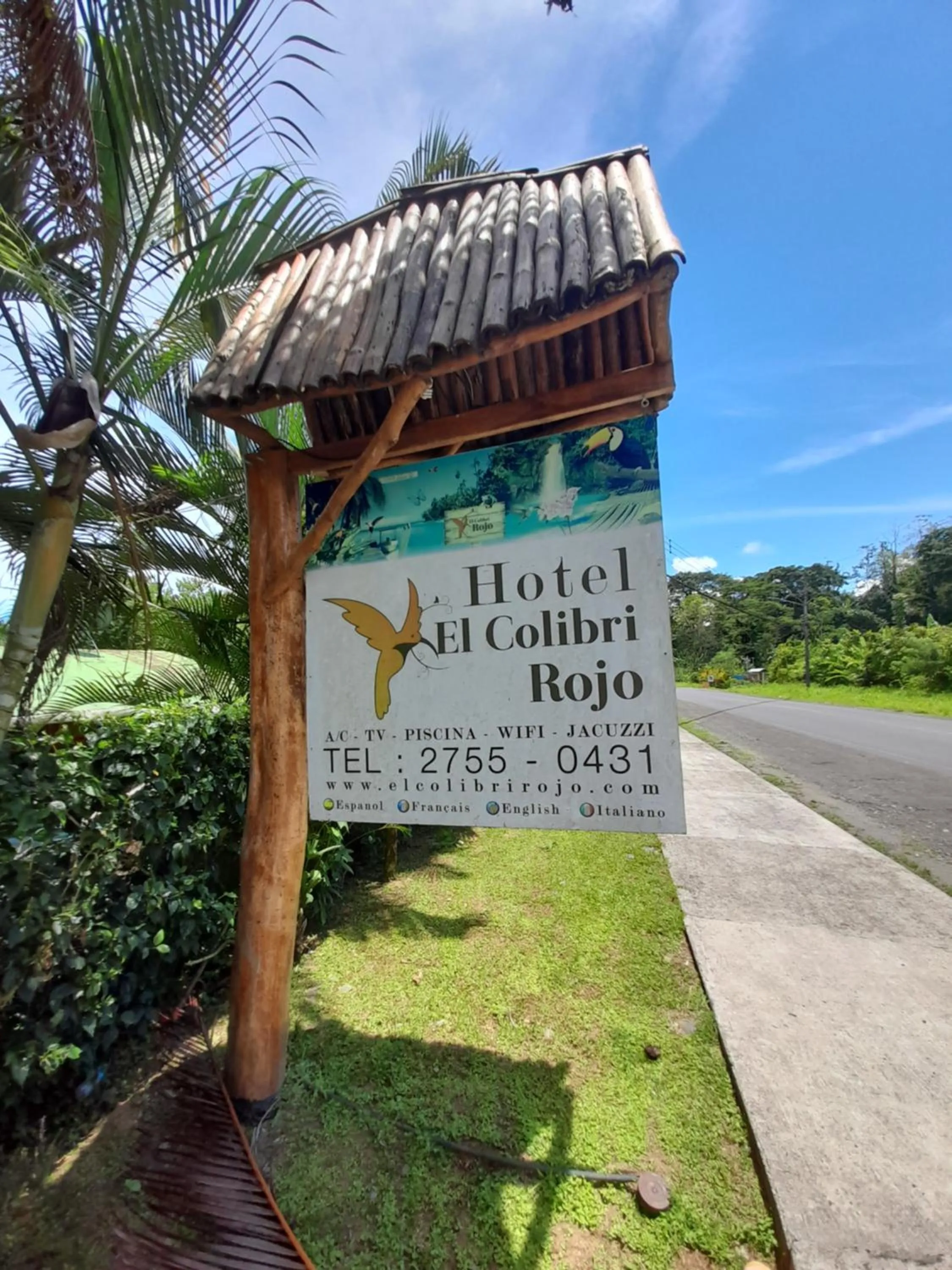 Property logo or sign in Hotel El Colibri Rojo