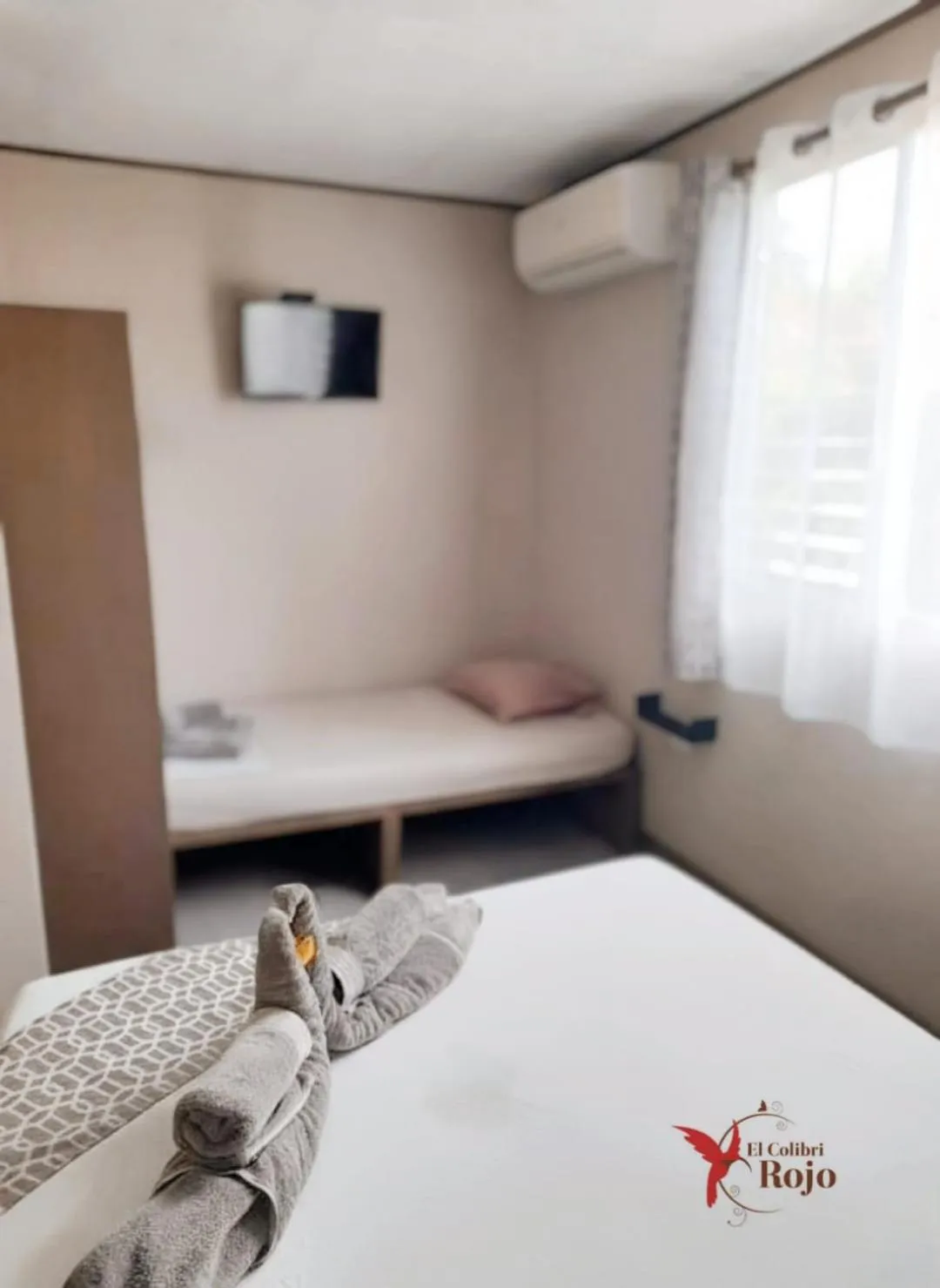 Bed in Hotel El Colibri Rojo