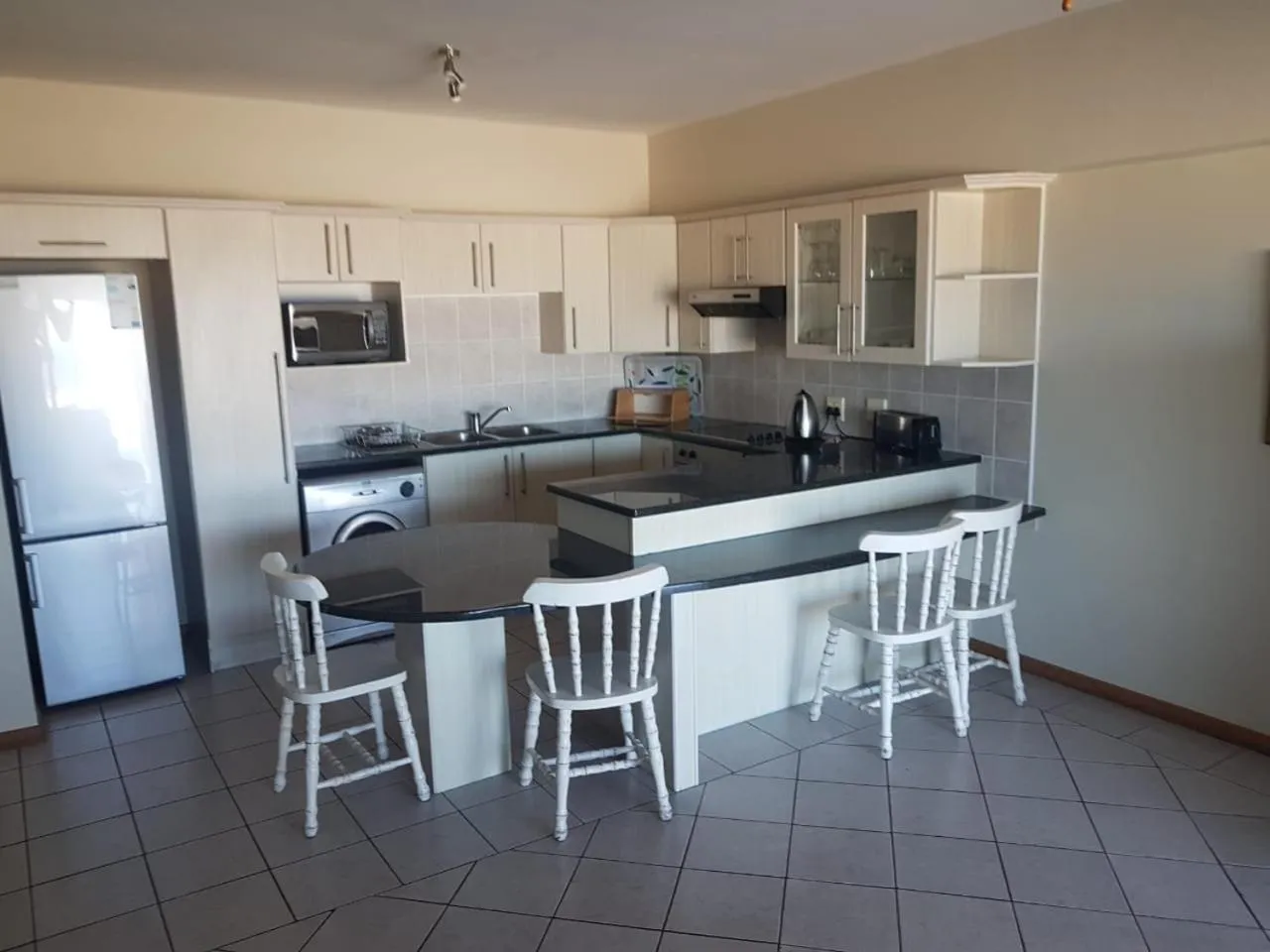 Kitchen or kitchenette in Seashells Holiday Apartments and Conference Centre