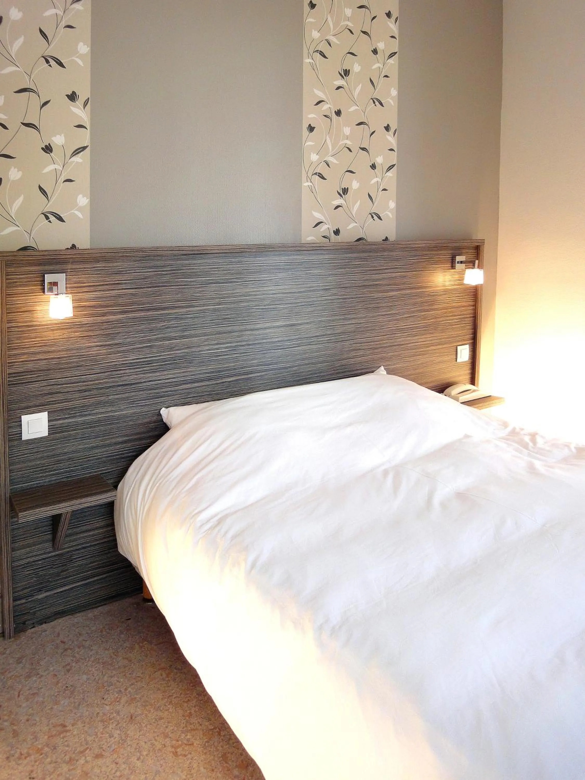 Bed in Hotel les Pecheurs