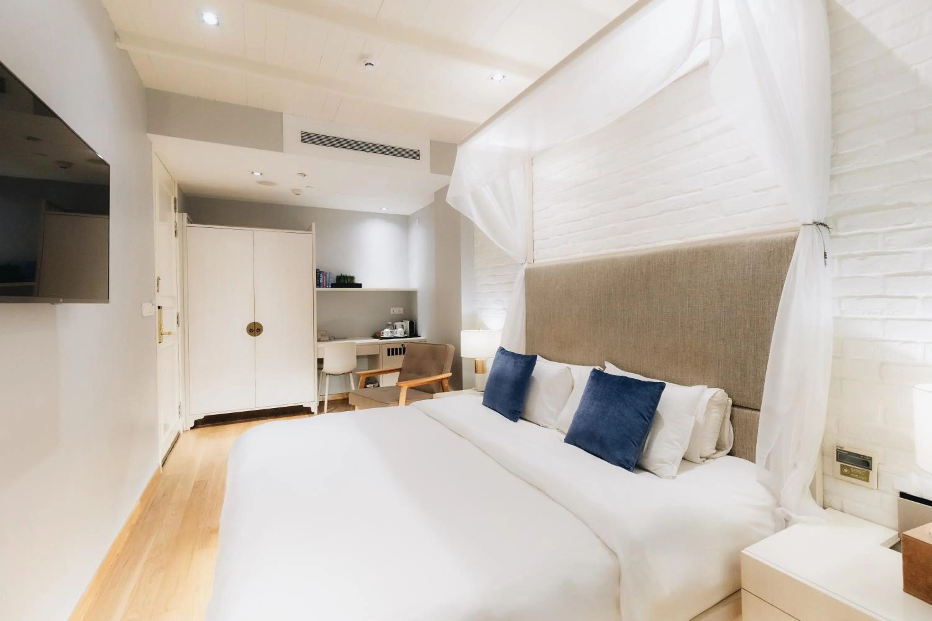 Bed in Hotel NuVe Heritage