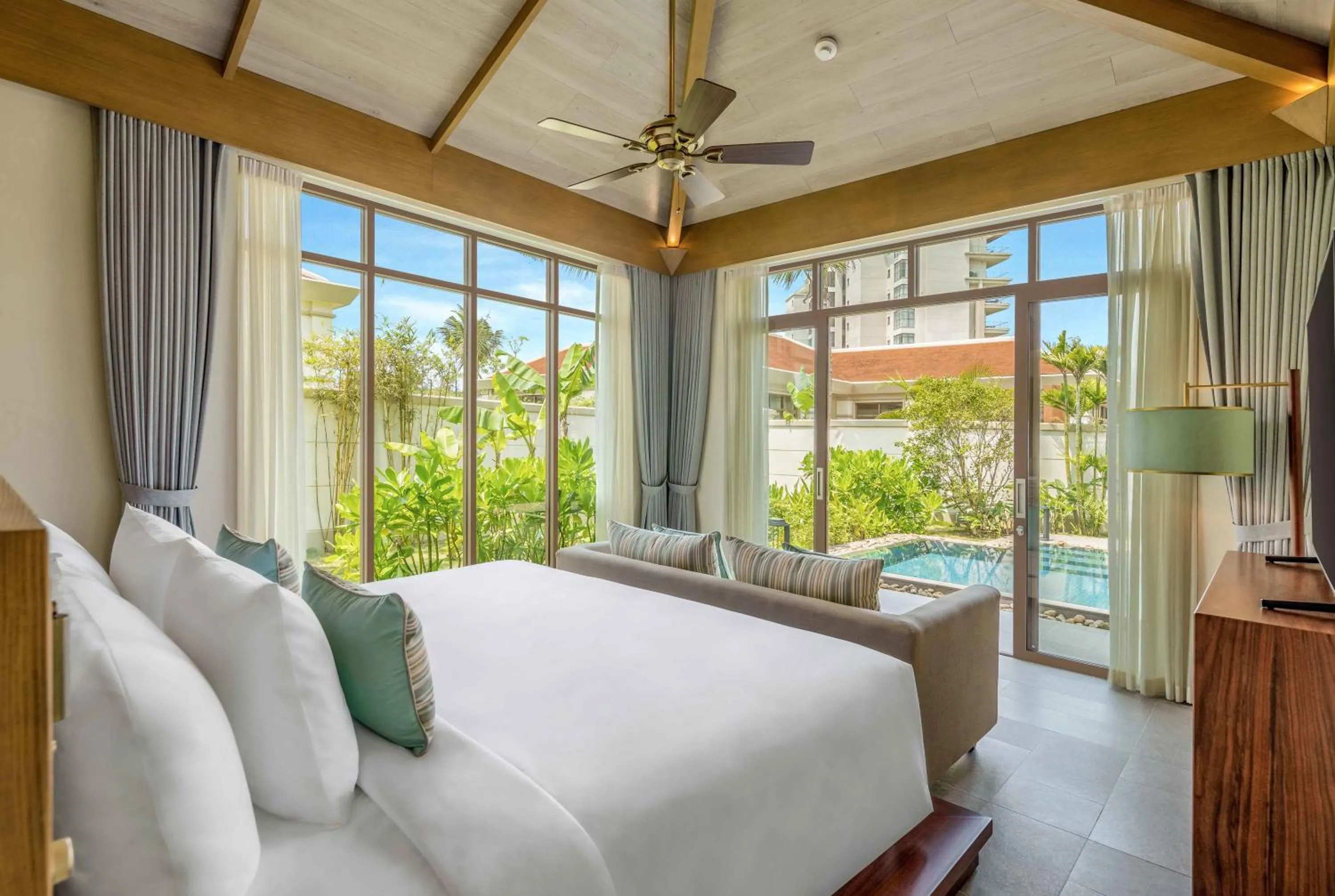 Bed in Fusion Resort and Villas Da Nang