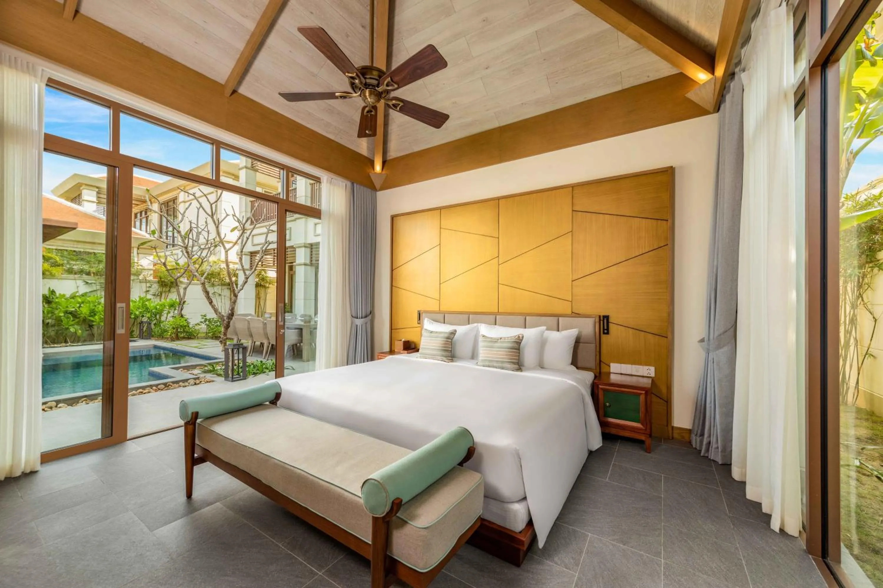 Bed in Fusion Resort and Villas Da Nang