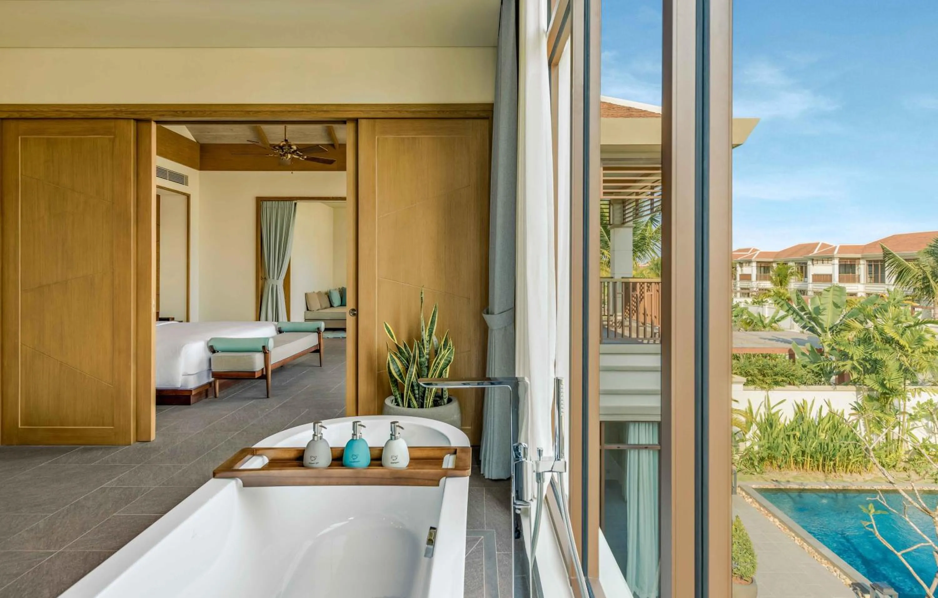 Bed in Fusion Resort and Villas Da Nang