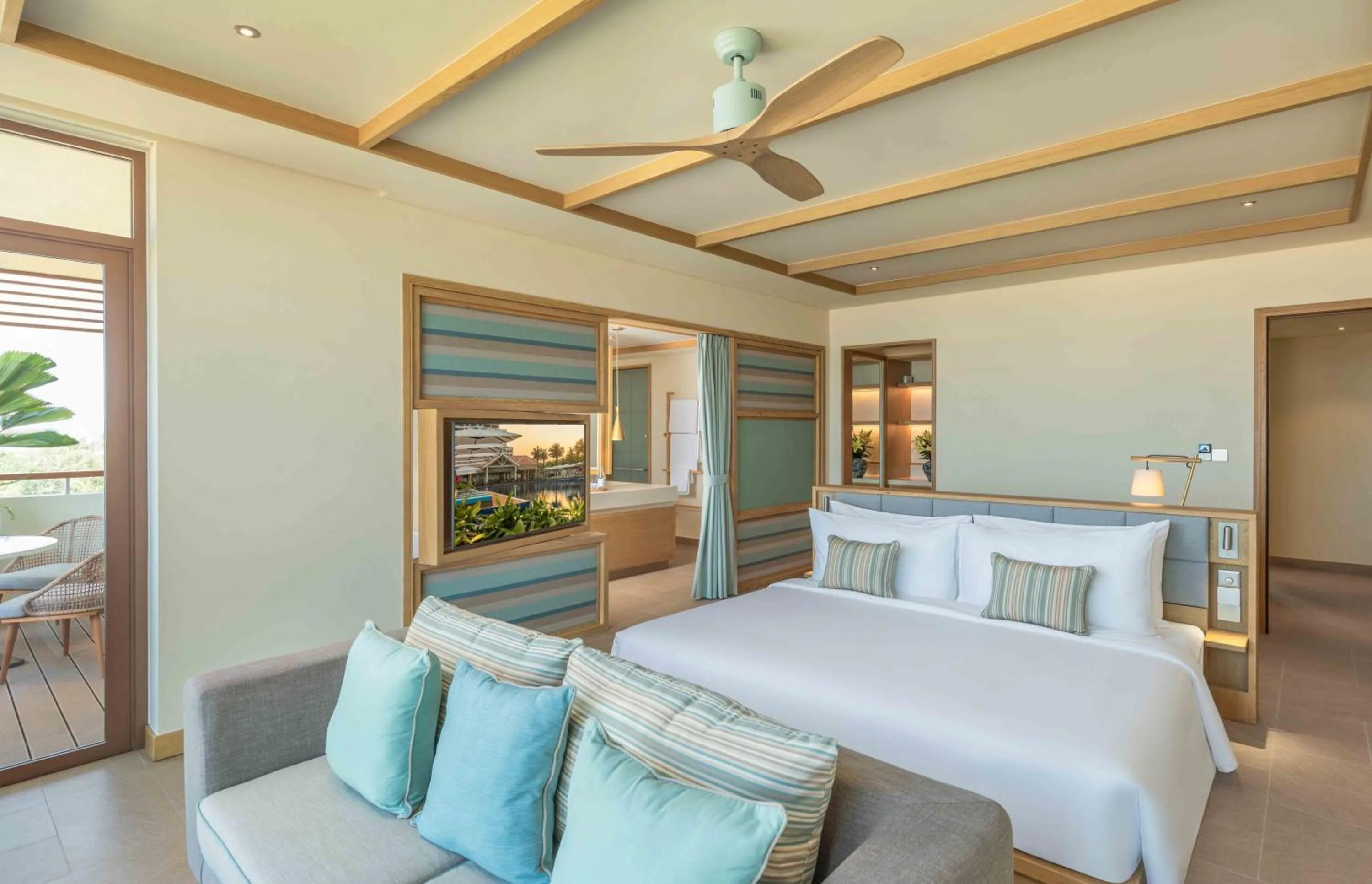 Bed in Fusion Resort and Villas Da Nang