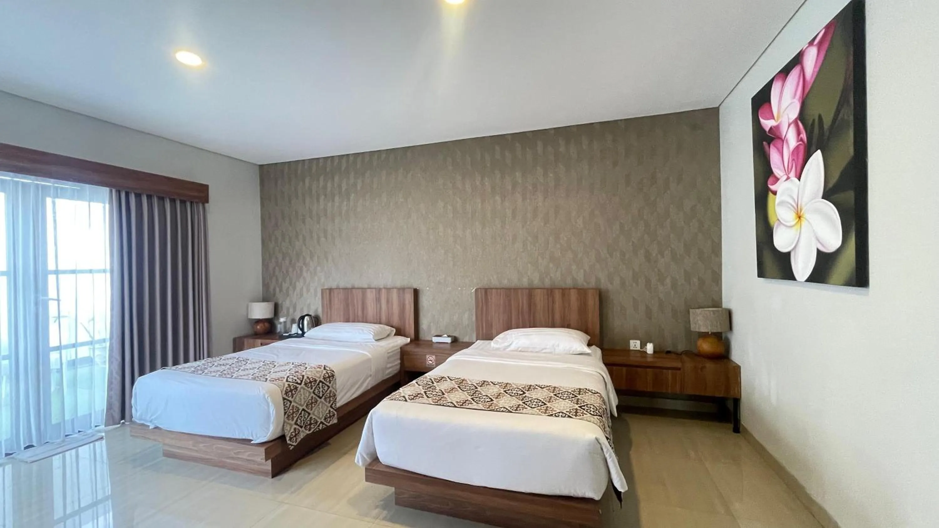 Bed in The BALIem Villa