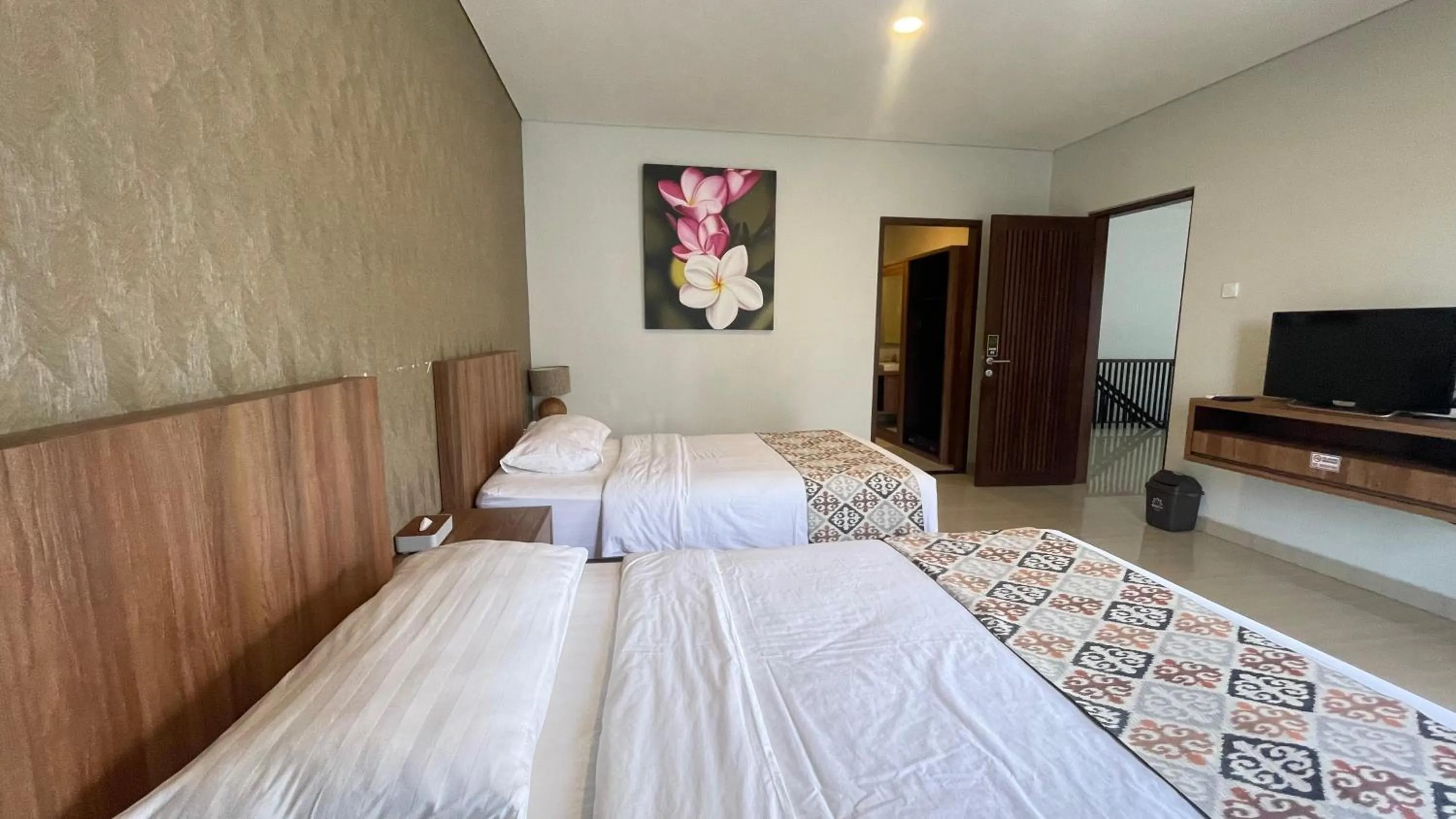 Bed in The BALIem Villa