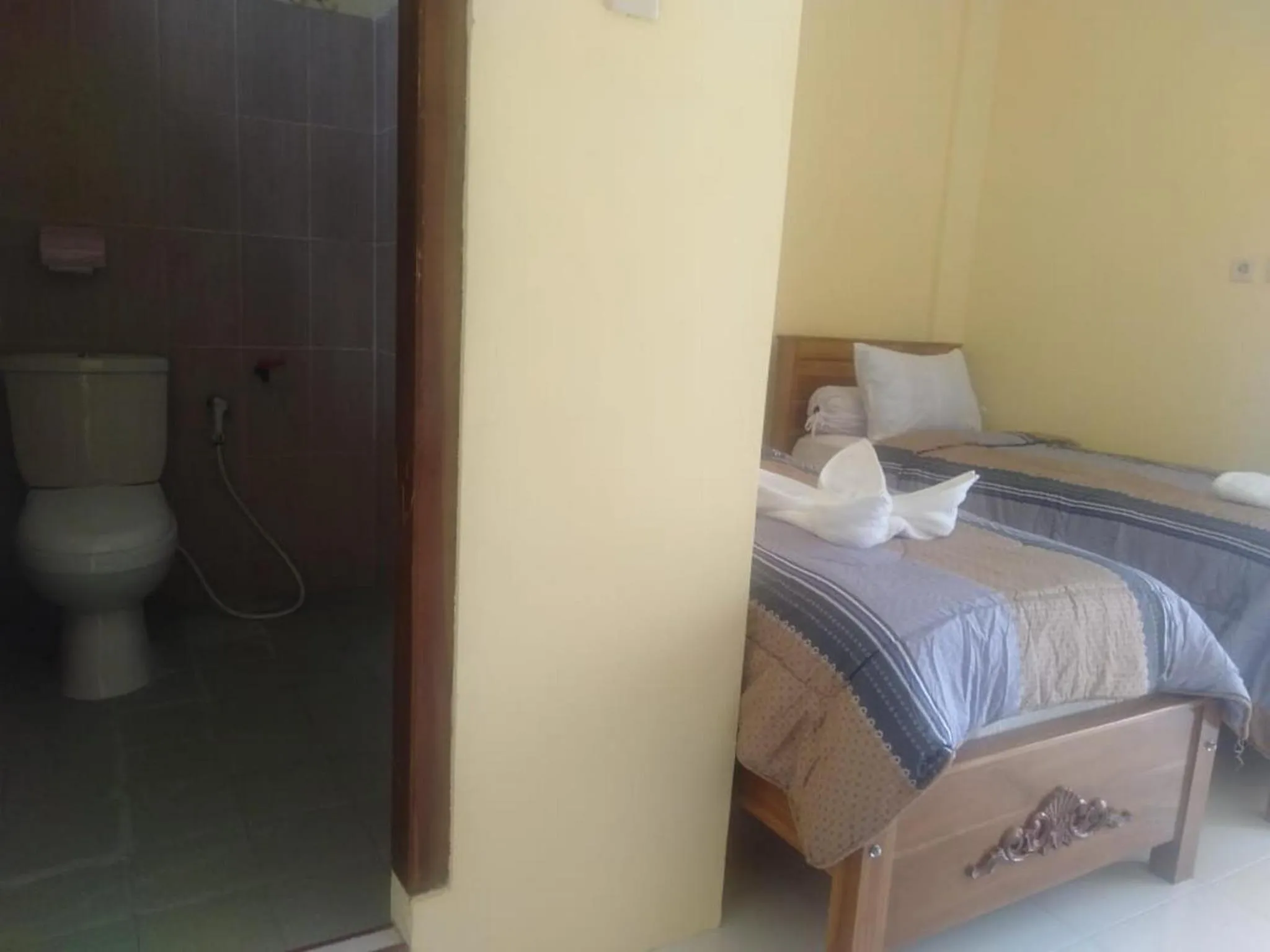 Bed in FIFAWIND HOTEL