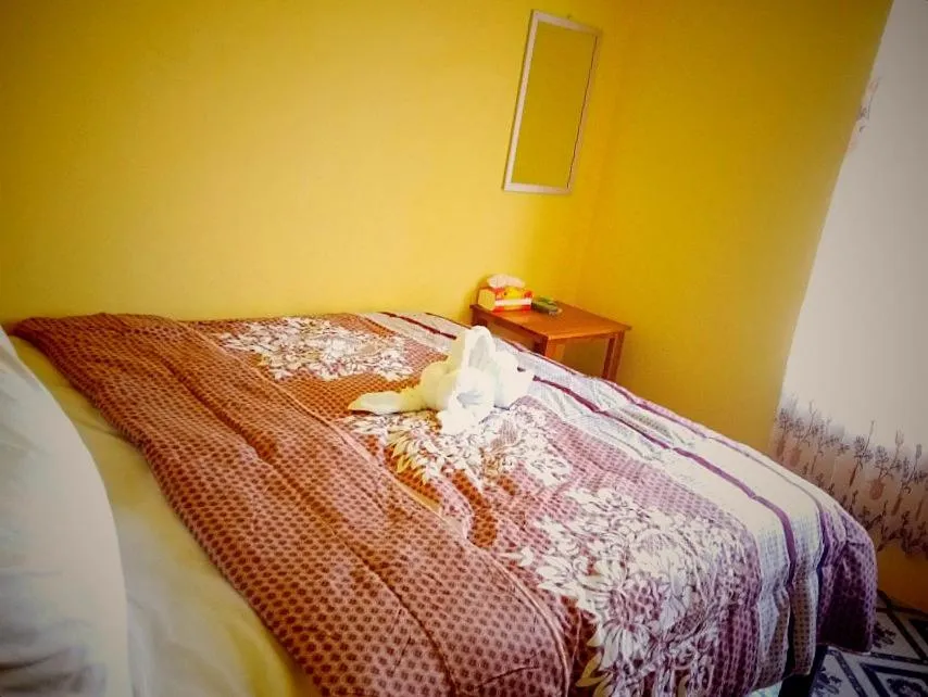 Bed in FIFAWIND HOTEL