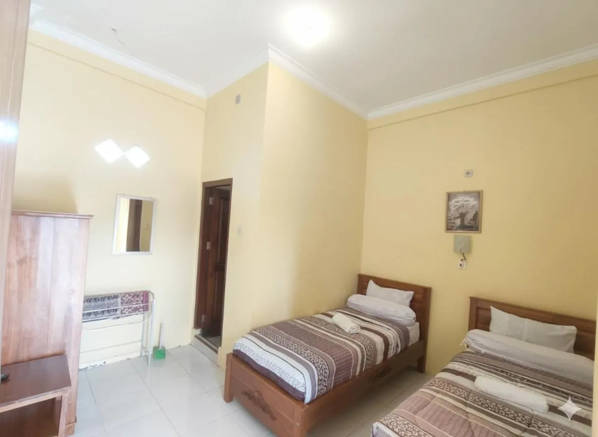 Bed in FIFAWIND HOTEL