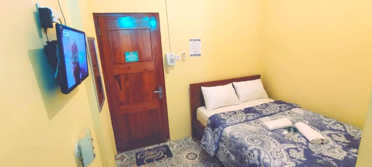 Bed in FIFAWIND HOTEL