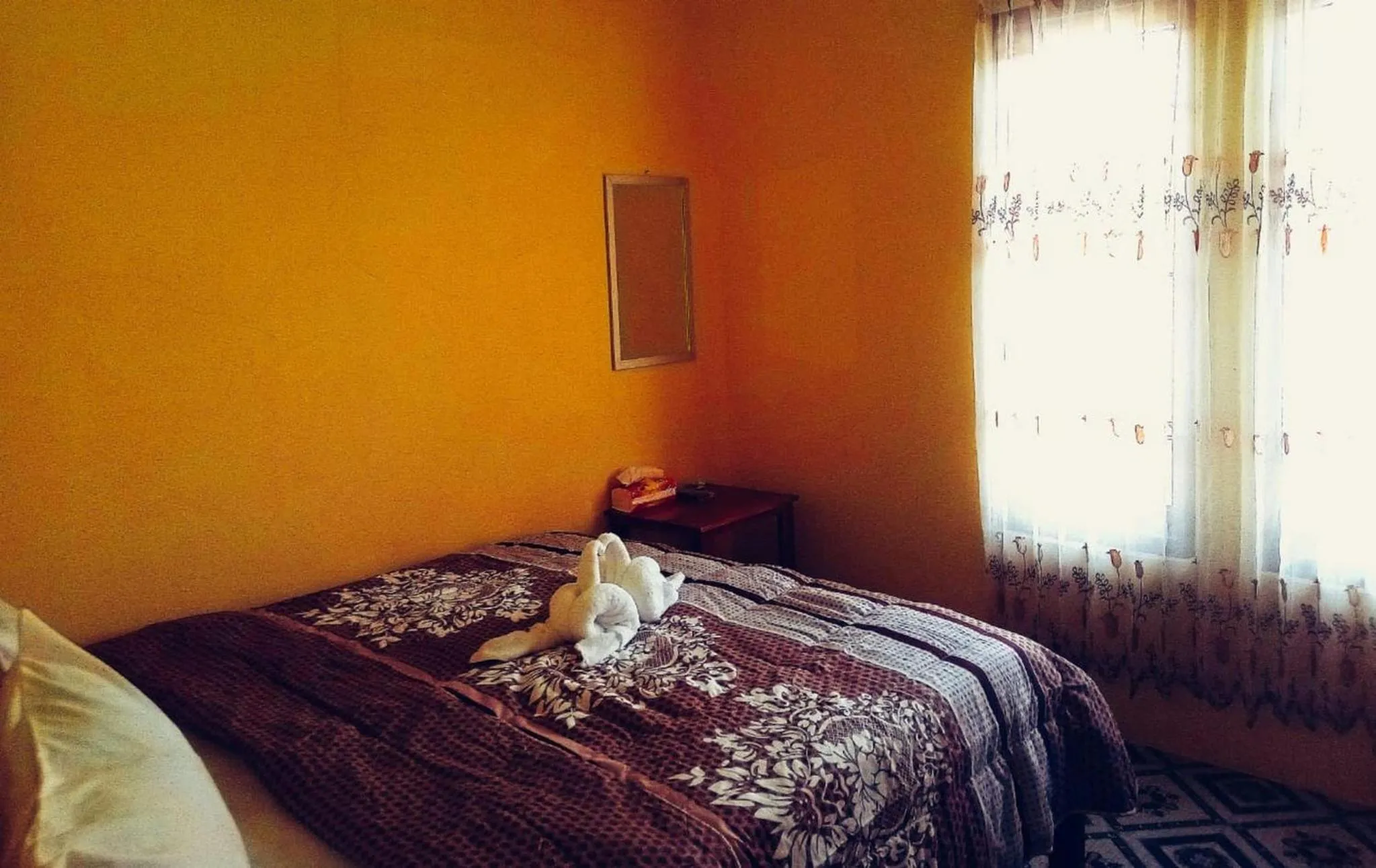 Bed in FIFAWIND HOTEL