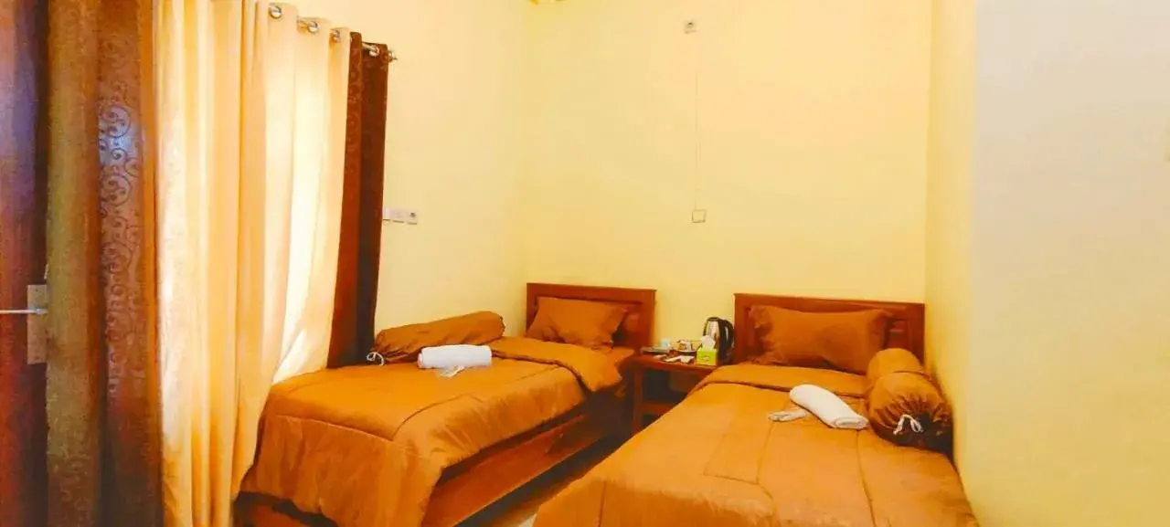 Twin Room with Shared Bathroom in FIFAWIND HOTEL Twin Room with Shared Bathroom in FIFAWIND HOTEL