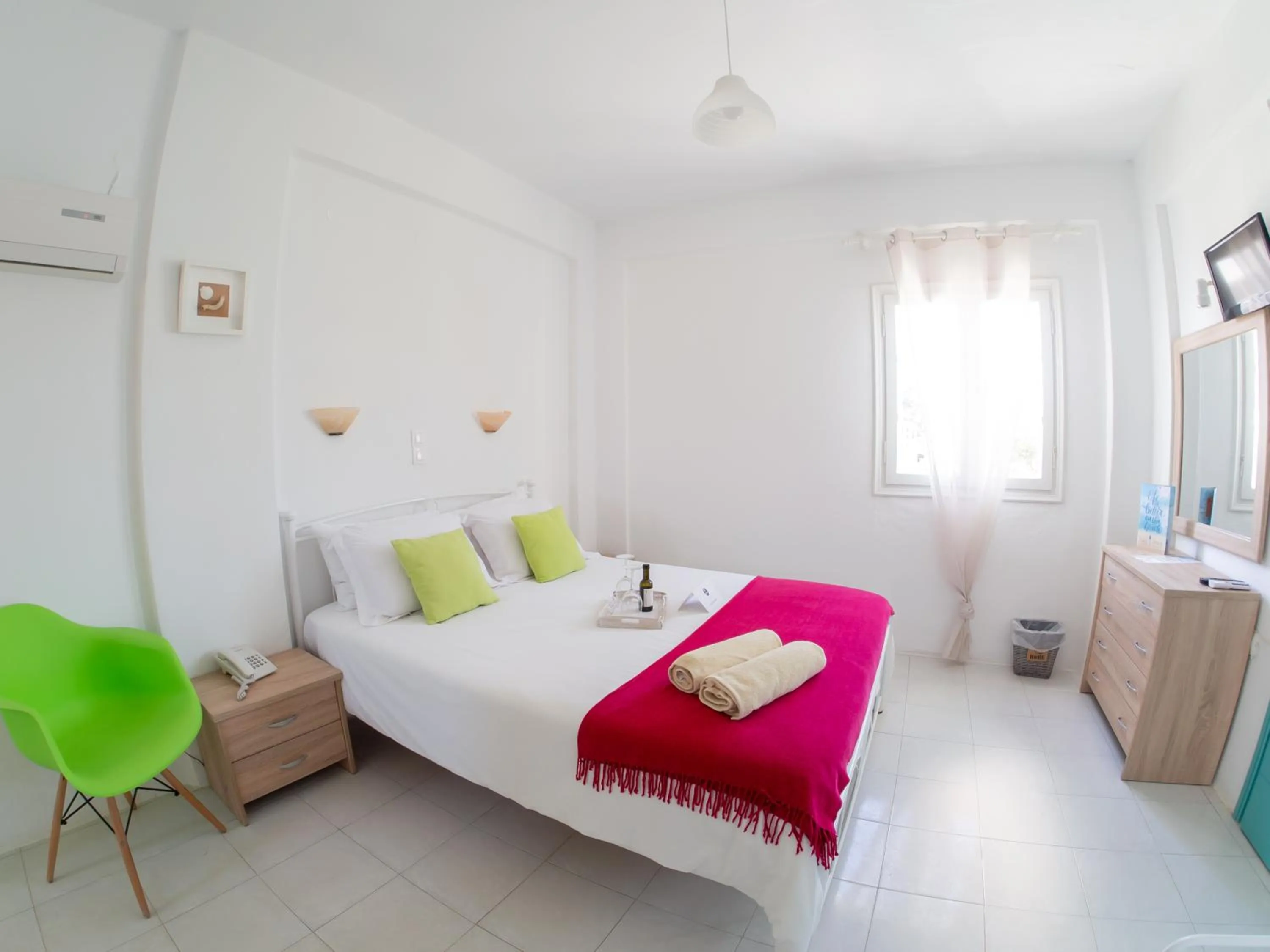 Bed in Amaryllis Beach Hotel